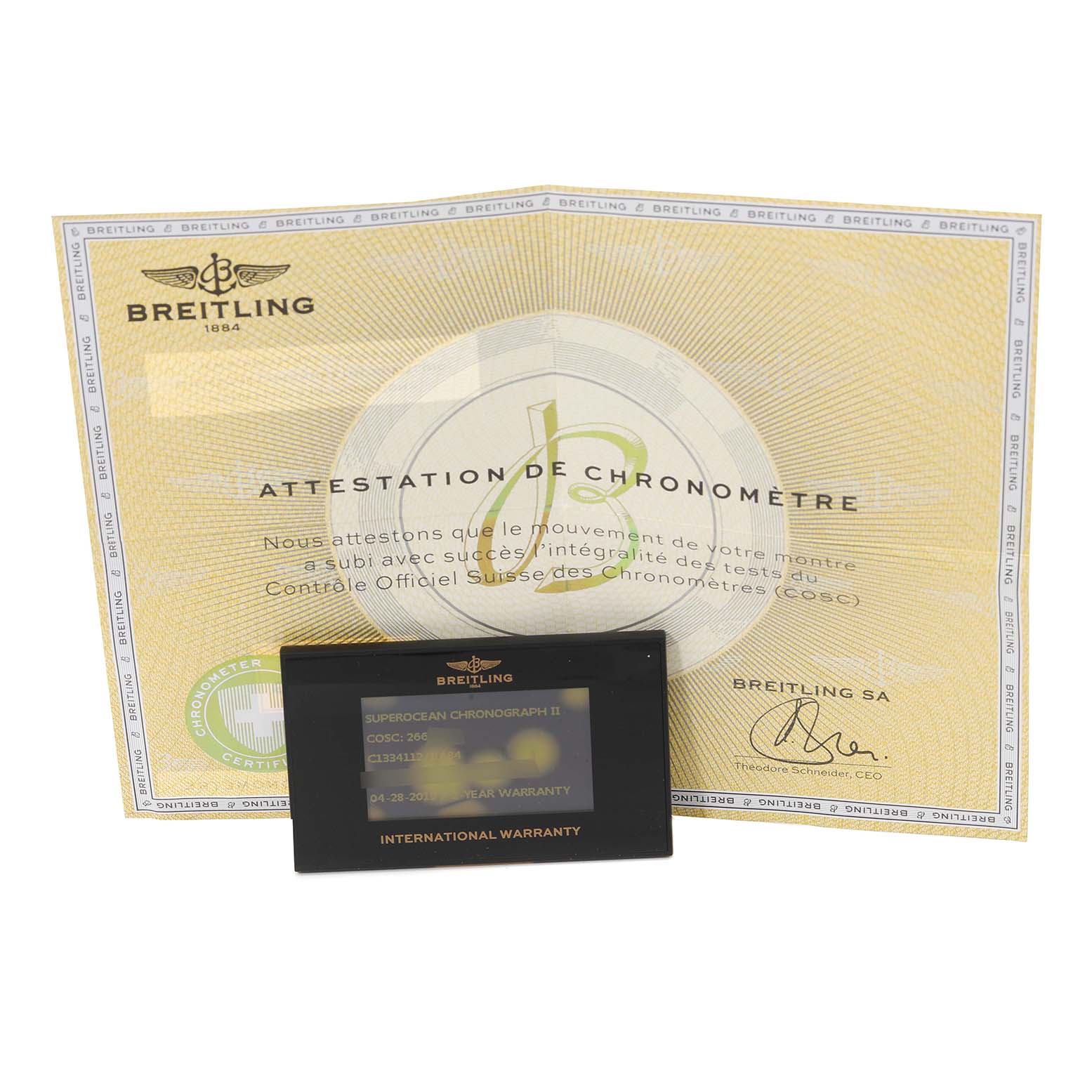 The image shows the certification paper and warranty card for a Breitling Superocean C13341 Men's Steel and Gold (two tone) Black Dial C13341 Men's Steel and Gold (two tone) Black Dial model watch.