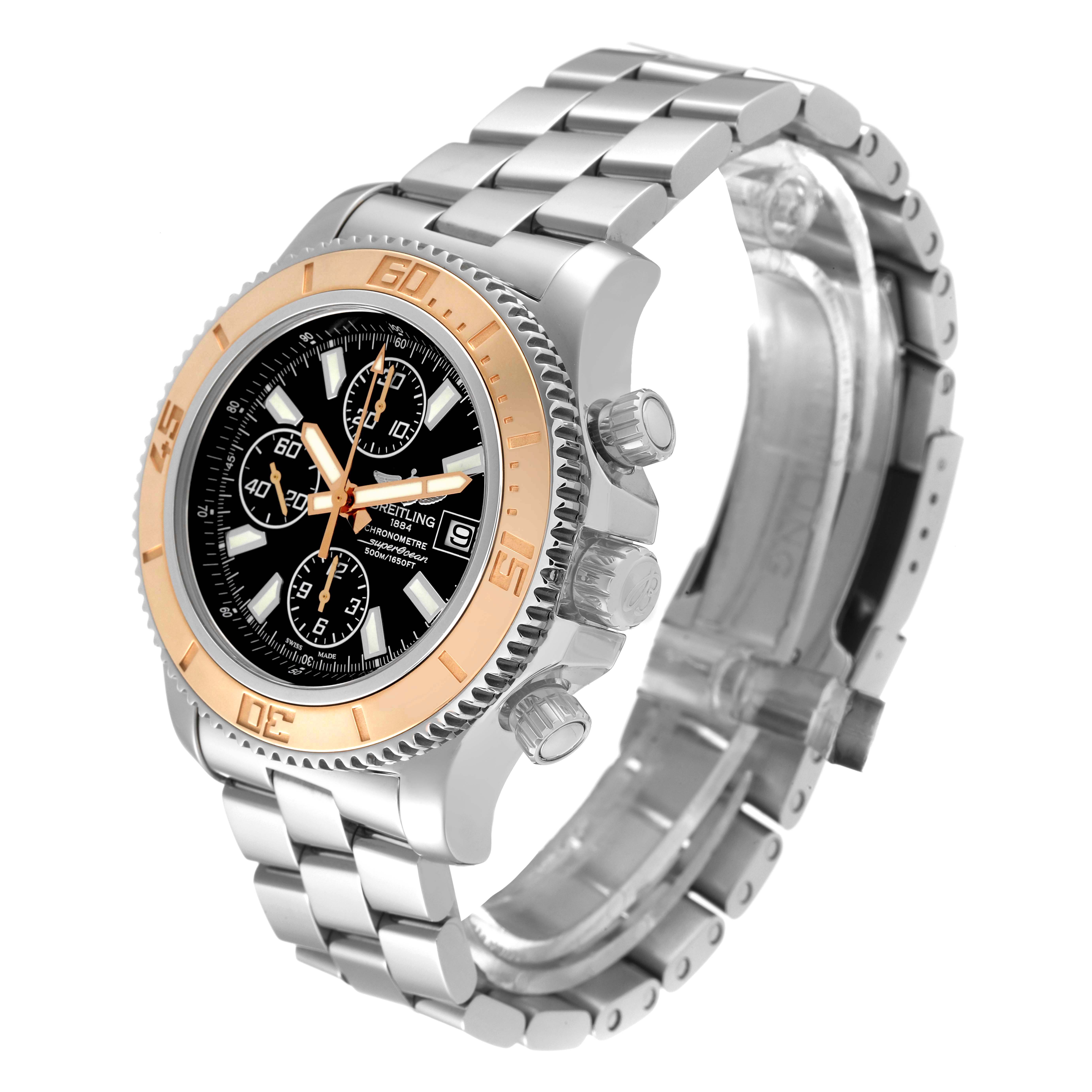 The image shows a Breitling Superocean C13341 Men's Steel and Gold (two tone) Black Dial C13341 Men's Steel and Gold (two tone) Black Dial watch at a three-quarter angle, highlighting the face, bezel, and metal bracelet.