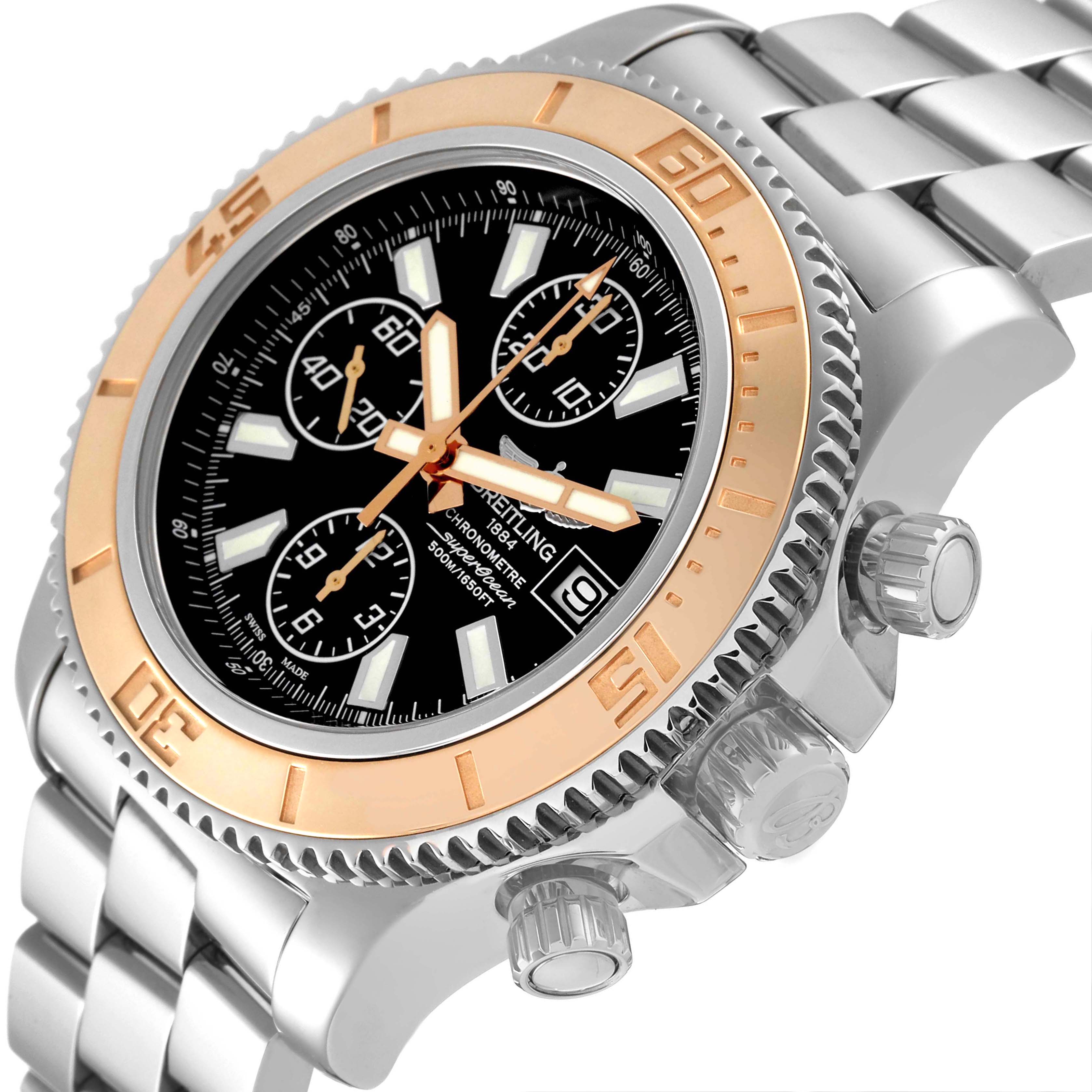 The image shows a close-up of the Breitling Superocean C13341 Men's Steel and Gold (two tone) Black Dial C13341 Men's Steel and Gold (two tone) Black Dial watch, highlighting its bezel, dial, chronograph sub-dials, and crown.