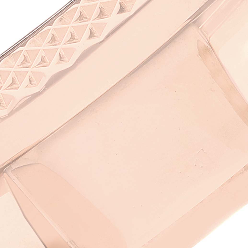 This close-up image shows the textured bezel of a Breitling Bentley R47362 Men's Rose Gold Black Dial R47362 Men's Rose Gold Black Dial model watch.