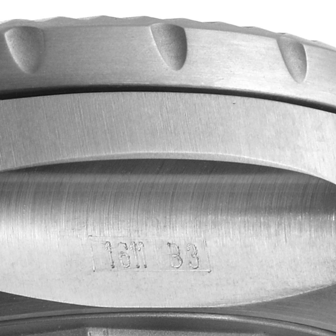 This is a close-up angle of the bezel and part of the case of a Breitling Bentley E27365 Men's Titanium Black Dial E27365 Men's Titanium Black Dial watch.