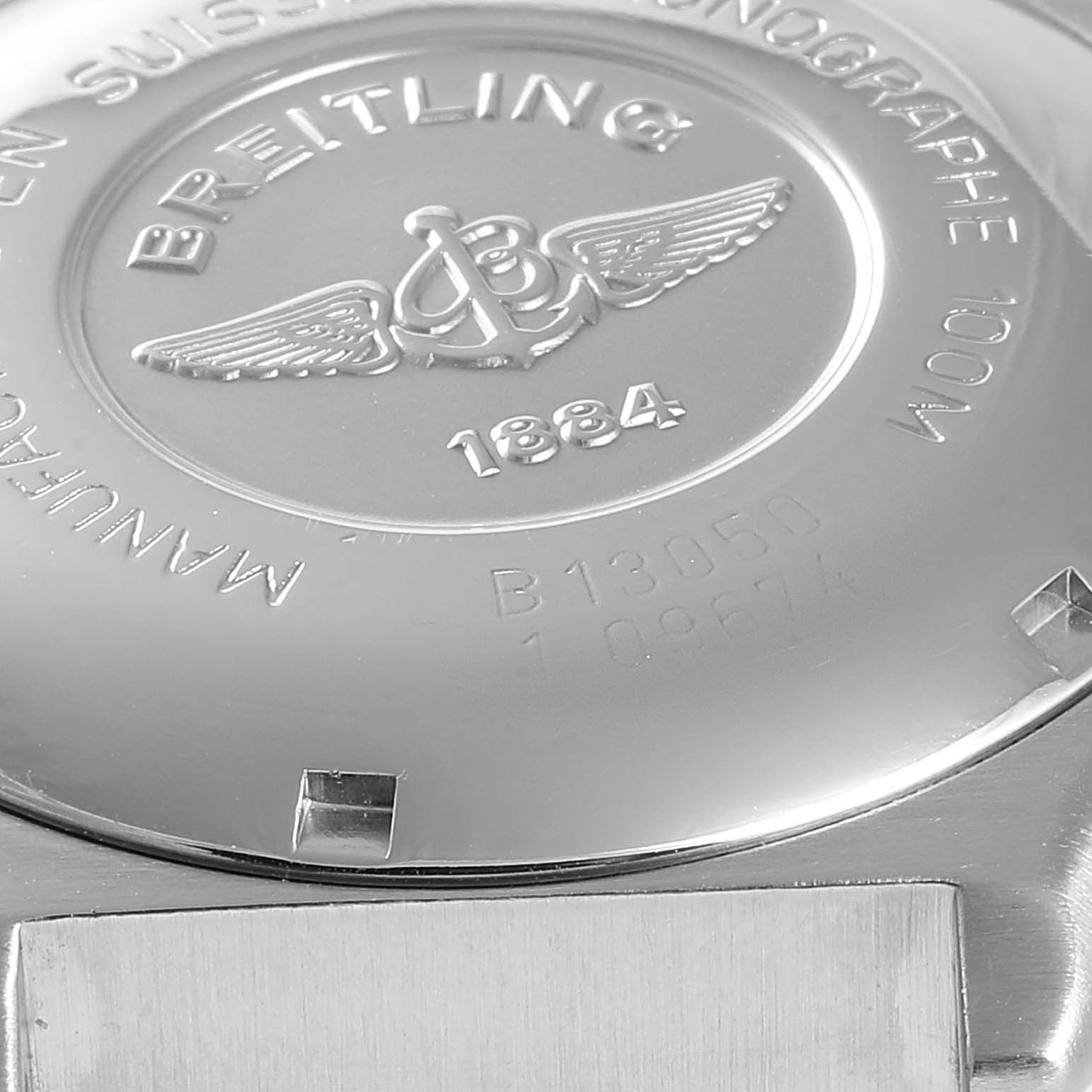 This is a close-up image showing the back case of a Breitling Chronomat B13050 Men's Steel and Gold (two tone) Silver Dial B13050 Men's Steel and Gold (two tone) Silver Dial watch.