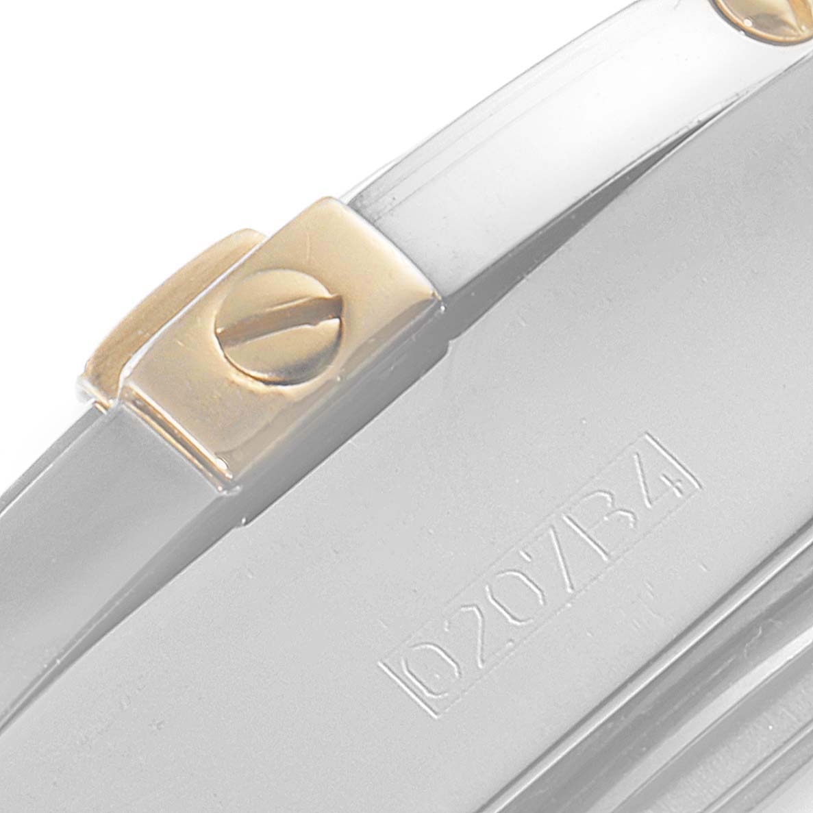 This image shows a close-up of the side of a Breitling Windrider B49350 Men's Steel and Gold (two tone) Black Dial B49350 Men's Steel and Gold (two tone) Black Dial watch, highlighting its metal and gold-plated components.