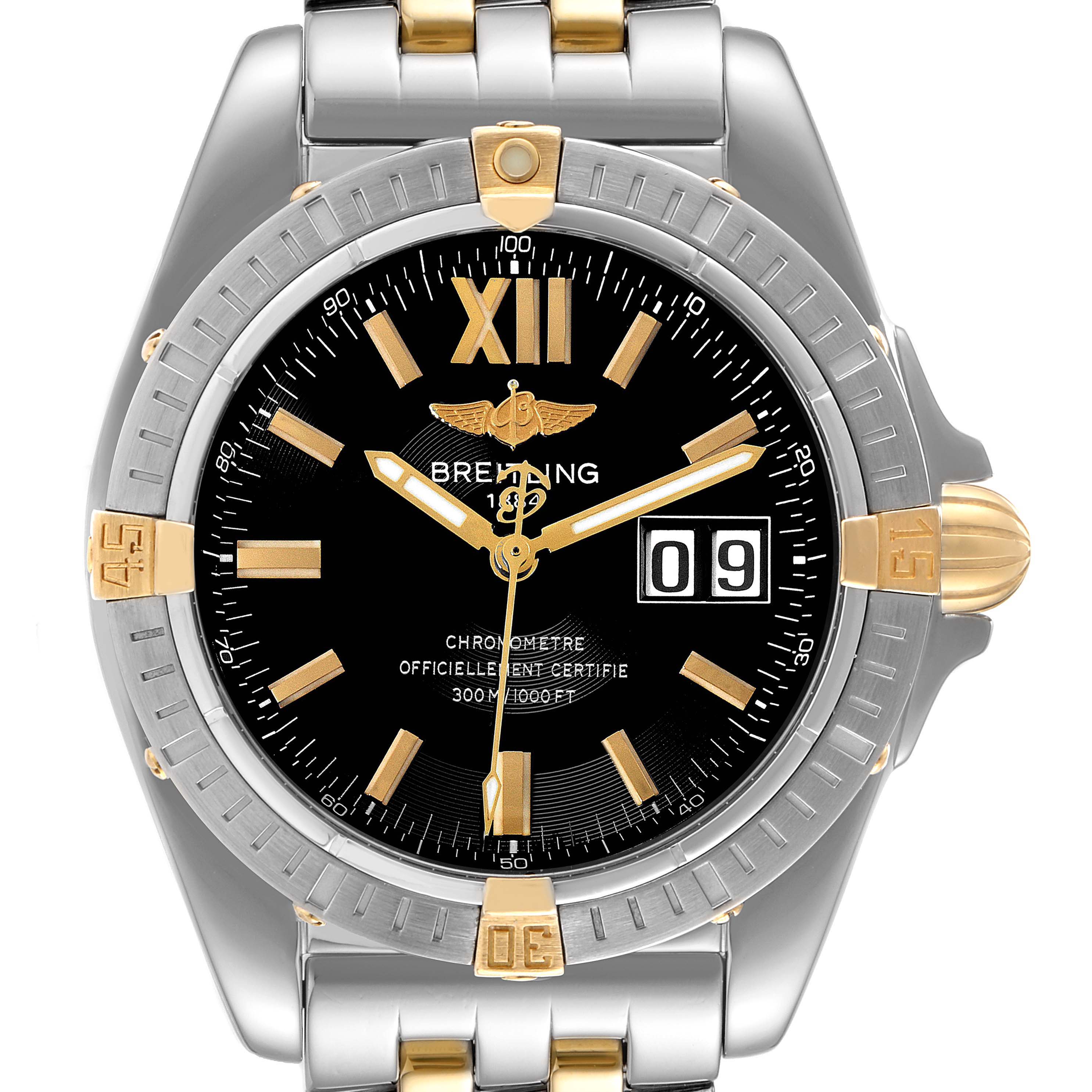 The image shows a front view of a Breitling Windrider B49350 Men's Steel and Gold (two tone) Black Dial B49350 Men's Steel and Gold (two tone) Black Dial watch, highlighting its black dial, gold accents, and two-tone silver and gold bracelet.