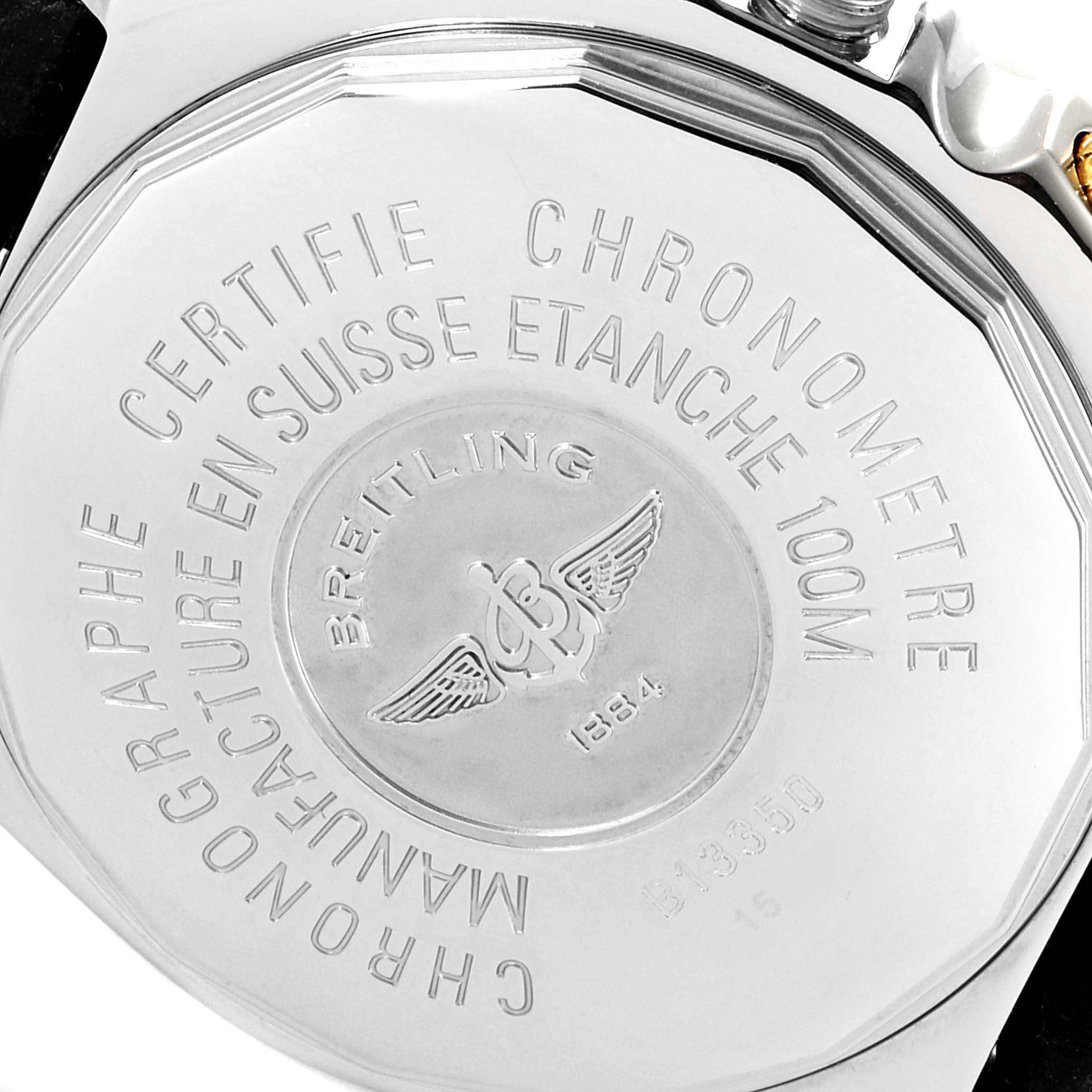 The image shows the back case of a Breitling Windrider B13350 Men's Steel and Gold (two tone) Black Dial B13350 Men's Steel and Gold (two tone) Black Dial watch, highlighting its engravings.