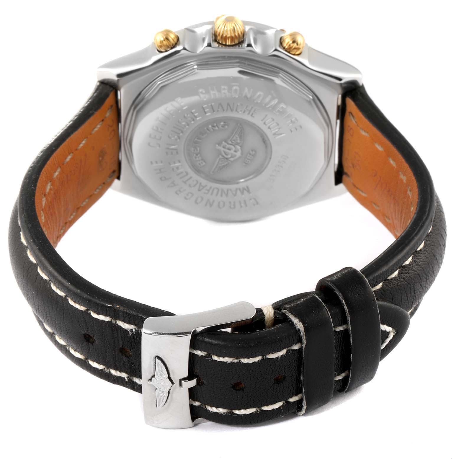 The image shows the back and strap of a Breitling Windrider B13350 Men's Steel and Gold (two tone) Black Dial B13350 Men's Steel and Gold (two tone) Black Dial watch, highlighting its case back, and black leather strap with a buckle.