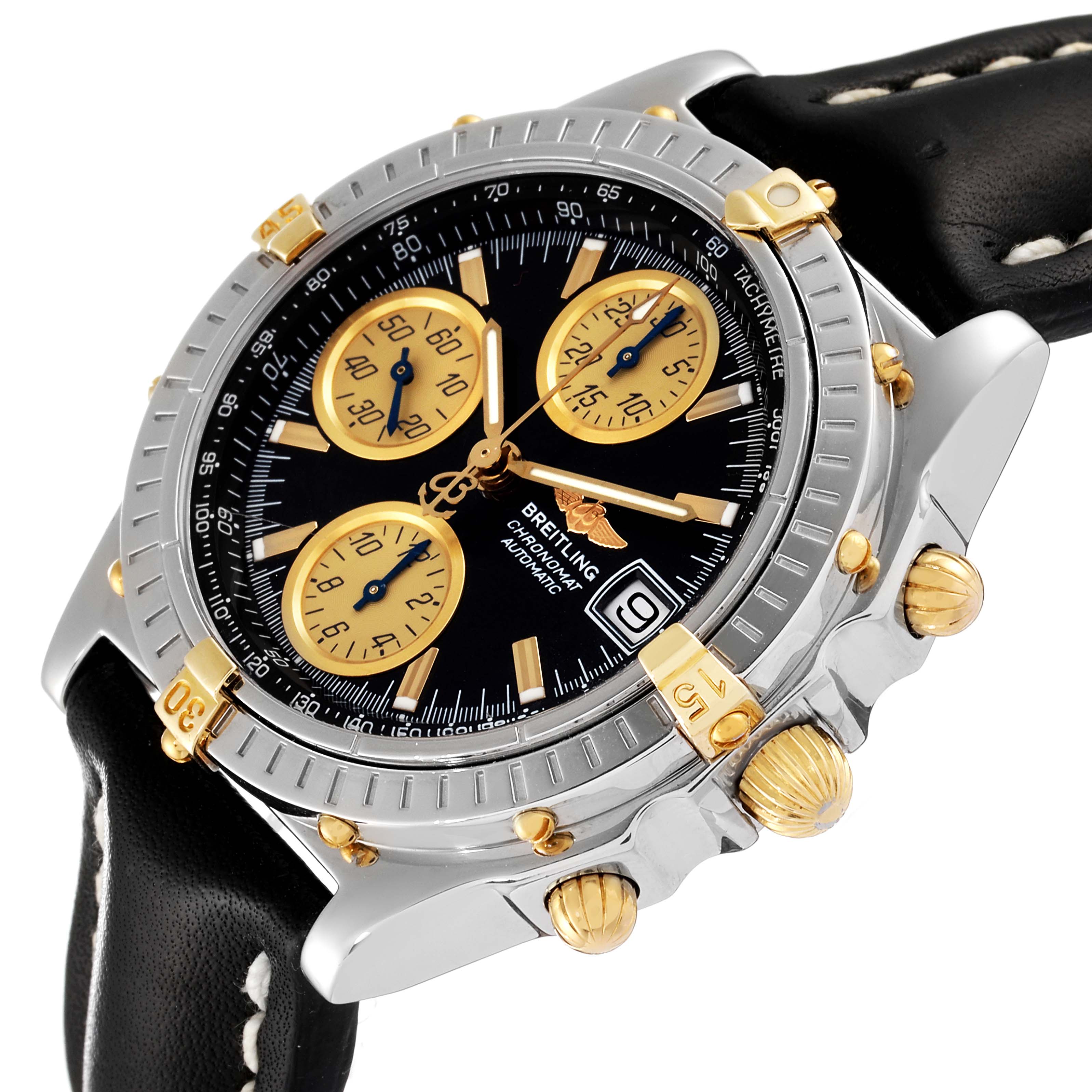 The image shows a close-up view of a Breitling Windrider B13350 Men's Steel and Gold (two tone) Black Dial B13350 Men's Steel and Gold (two tone) Black Dial watch highlighting its dial, bezel, chronograph sub-dials, and date display.