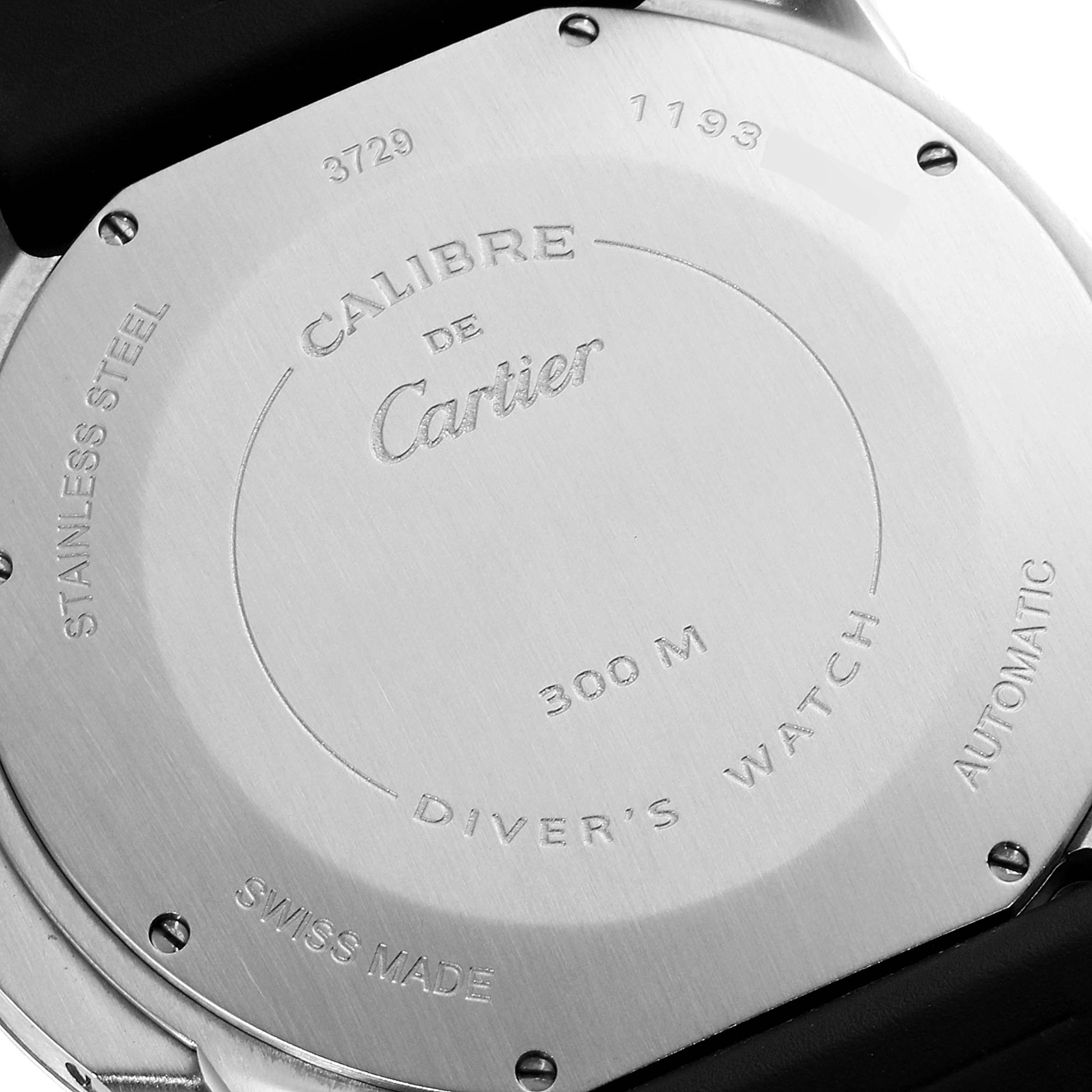 The image shows the back case of a Calibre de Cartier watch by Cartier, indicating it is stainless steel and water-resistant up to 300 meters.