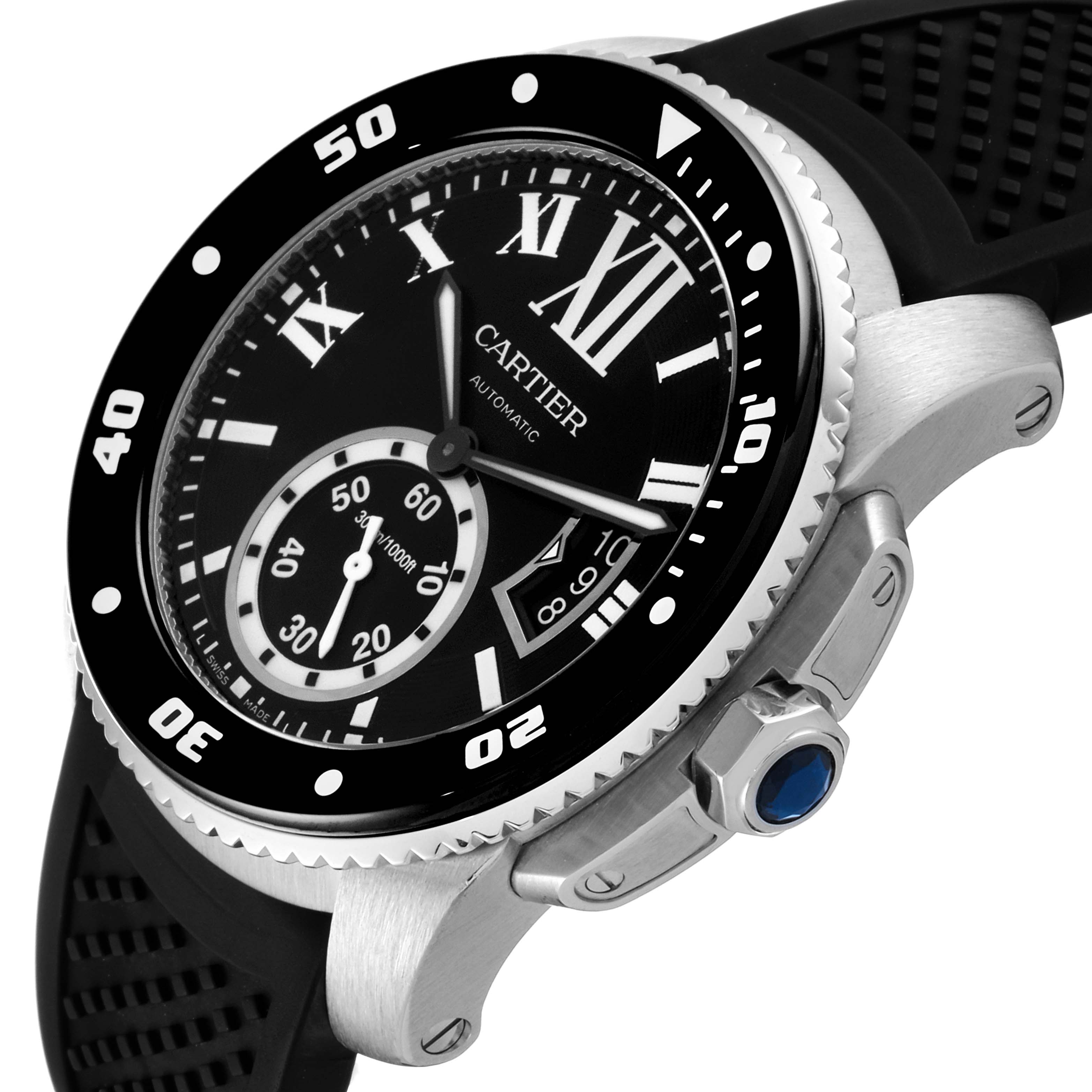 This image shows a close-up, angled view of the dial and bezel of the Calibre de Cartier watch by Cartier.