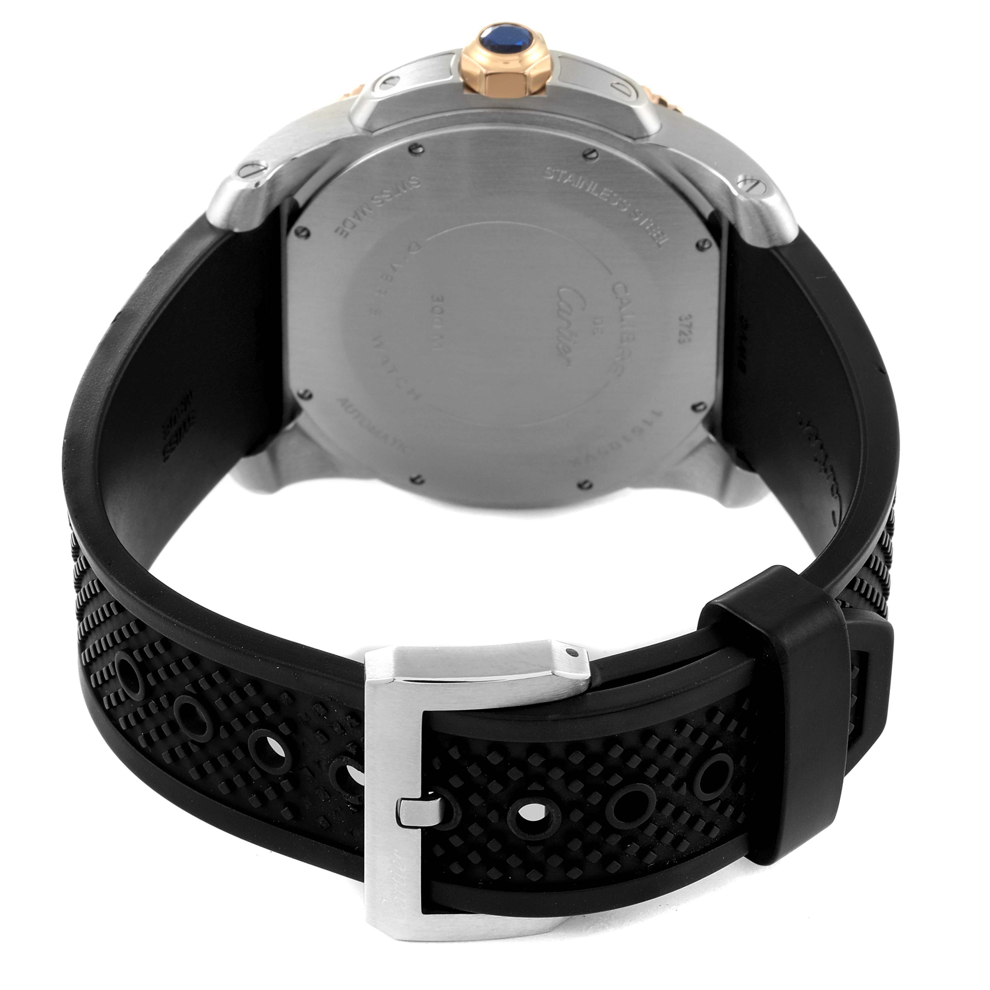 This image shows the back case and strap of a Calibre de Cartier watch by Cartier.