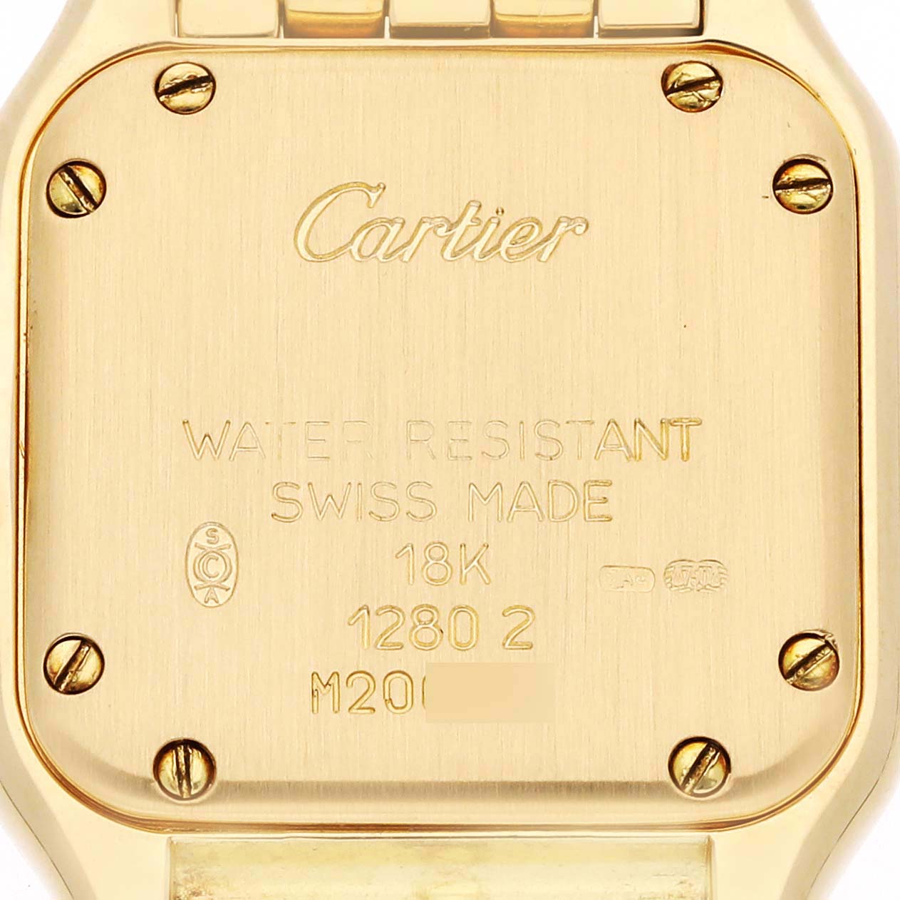 The image shows the back of a Cartier Panthere WF3070B9 Women's Yellow Gold Silver Dial WF3070B9 Women's Yellow Gold Silver Dial watch, highlighting its markings and screws.