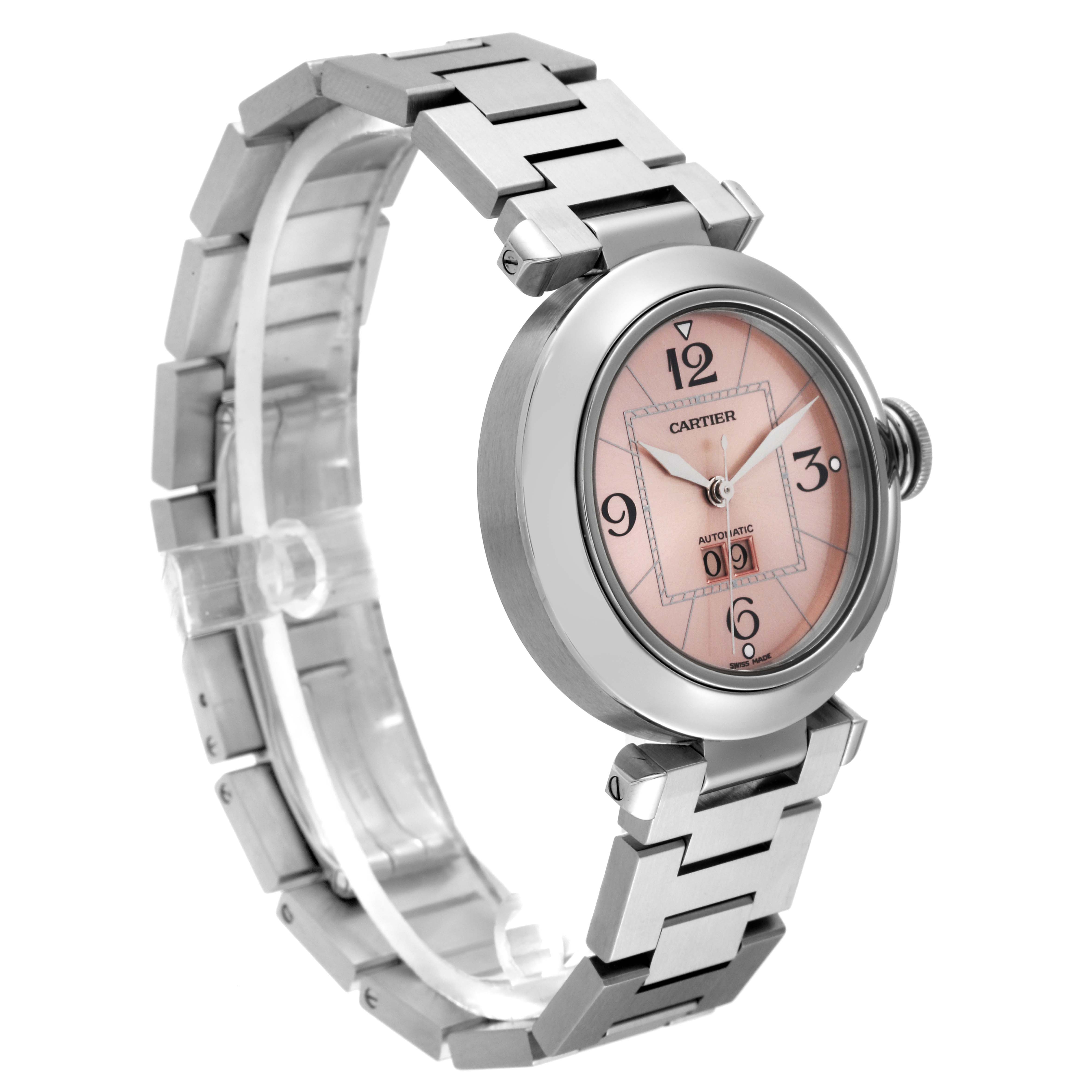 The Cartier Pasha W31058M7 Women's Stainless Steel Pink Dial W31058M7 Women's Stainless Steel Pink Dial watch is shown at a slight angle highlighting its pink dial, case, and metal bracelet strap.