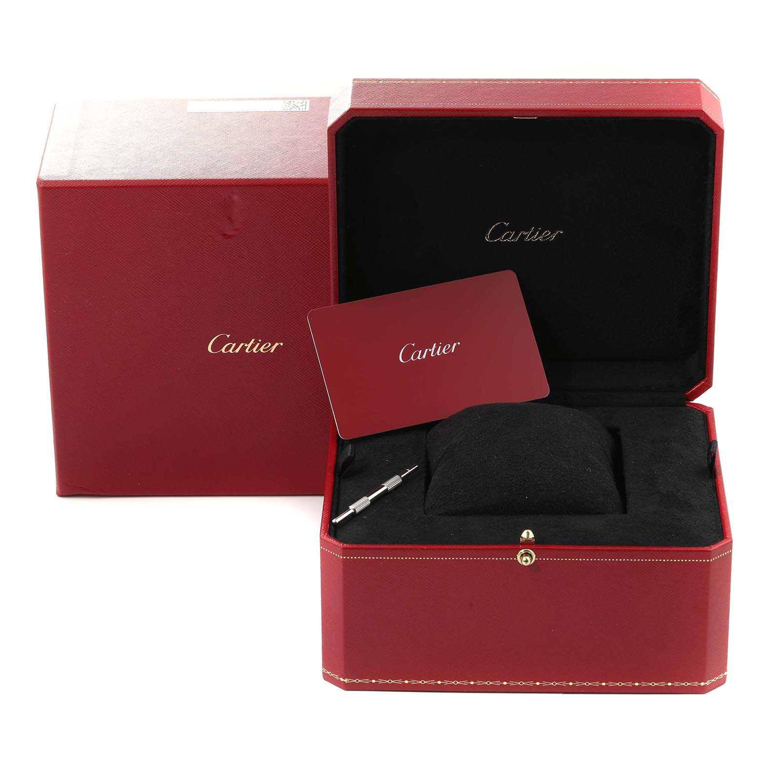 This image shows an open Cartier Santos W4SA0006 Men's Stainless Steel Blue Dial W4SA0006 Men's Stainless Steel Blue Dial watch box with a tool and a Cartier card.