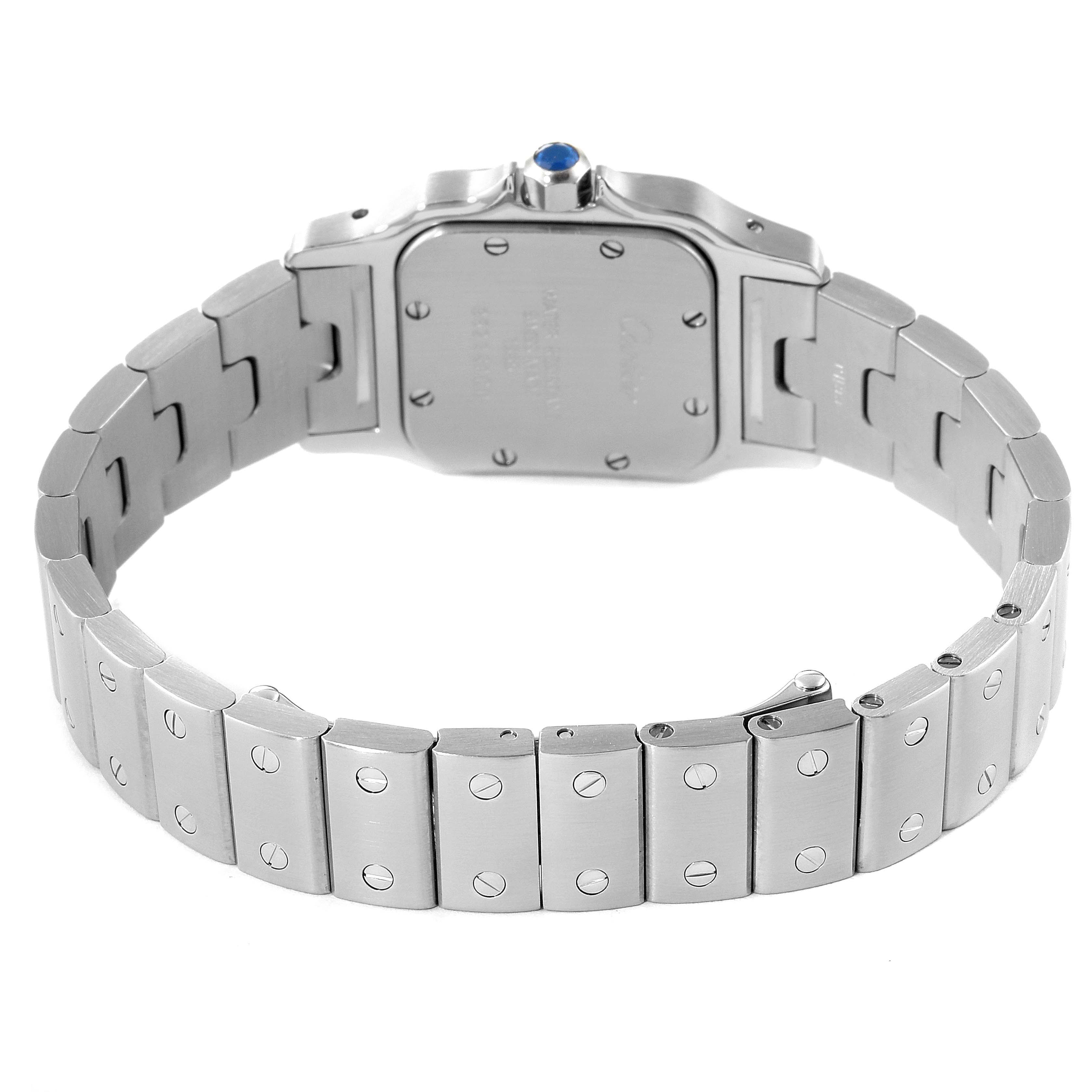 The image shows the backside of a Cartier Santos W20056D6 Women's Stainless Steel Silver Dial W20056D6 Women's Stainless Steel Silver Dial watch, highlighting the metal bracelet and case back.