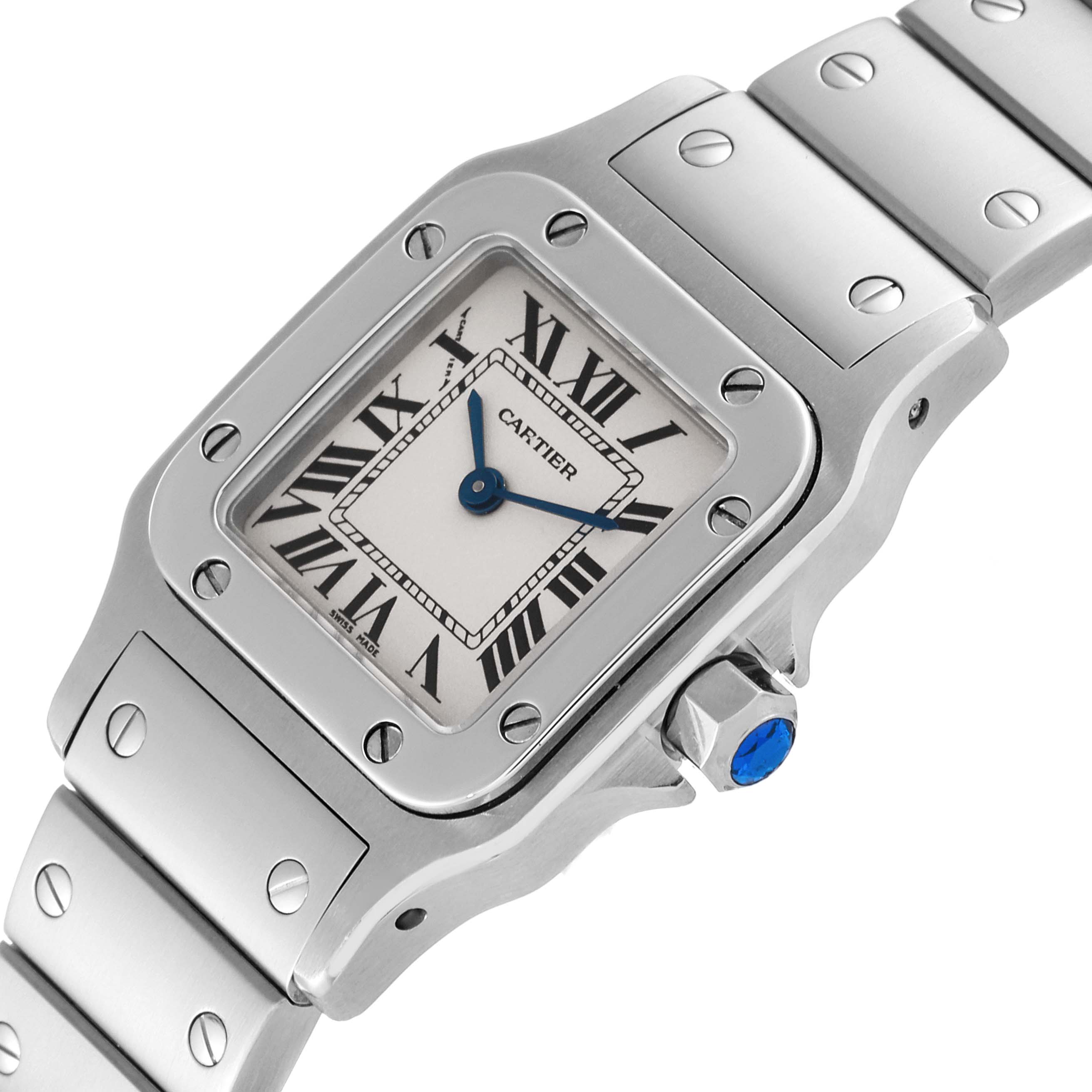 This is a close-up angled view of the Cartier Santos W20056D6 Women's Stainless Steel Silver Dial W20056D6 Women's Stainless Steel Silver Dial watch, showing the face, bezel, crown, and part of the bracelet.