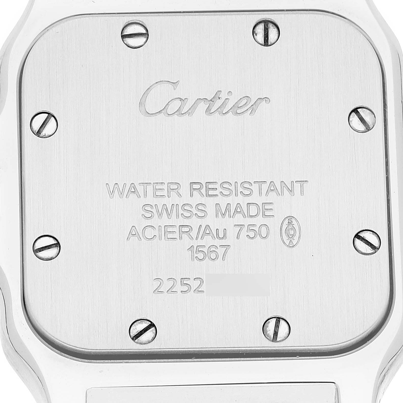 The image shows the back case of a Cartier Santos W20012C4 Women's Steel and Gold (two tone) Silver Dial W20012C4 Women's Steel and Gold (two tone) Silver Dial watch, highlighting the engraved inscriptions and screws.