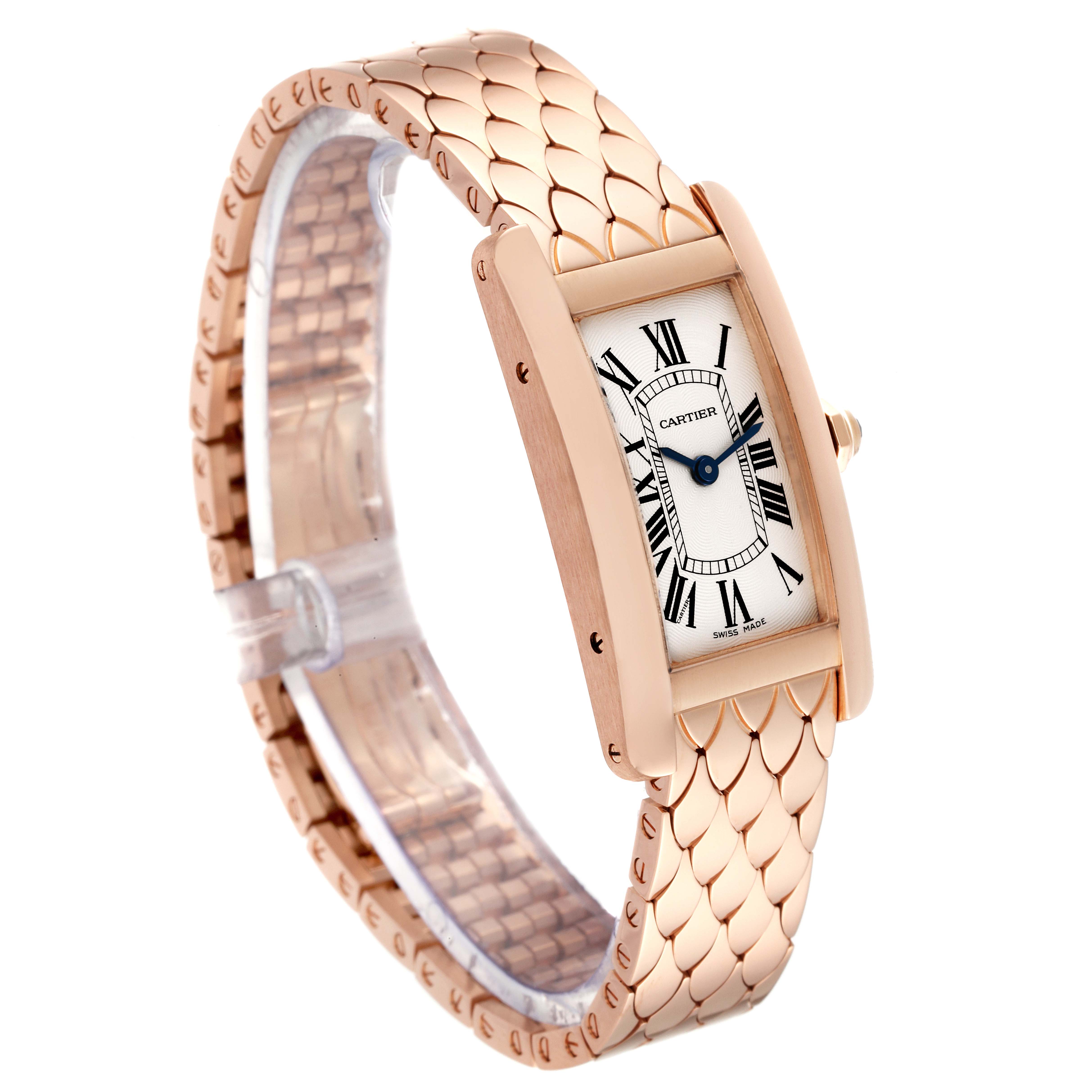The image shows a Cartier Tank Americaine W2620031 Women's Rose Gold Silver Dial W2620031 Women's Rose Gold Silver Dial watch, displaying its face, bezel, and gold bracelet at a three-quarter angle.