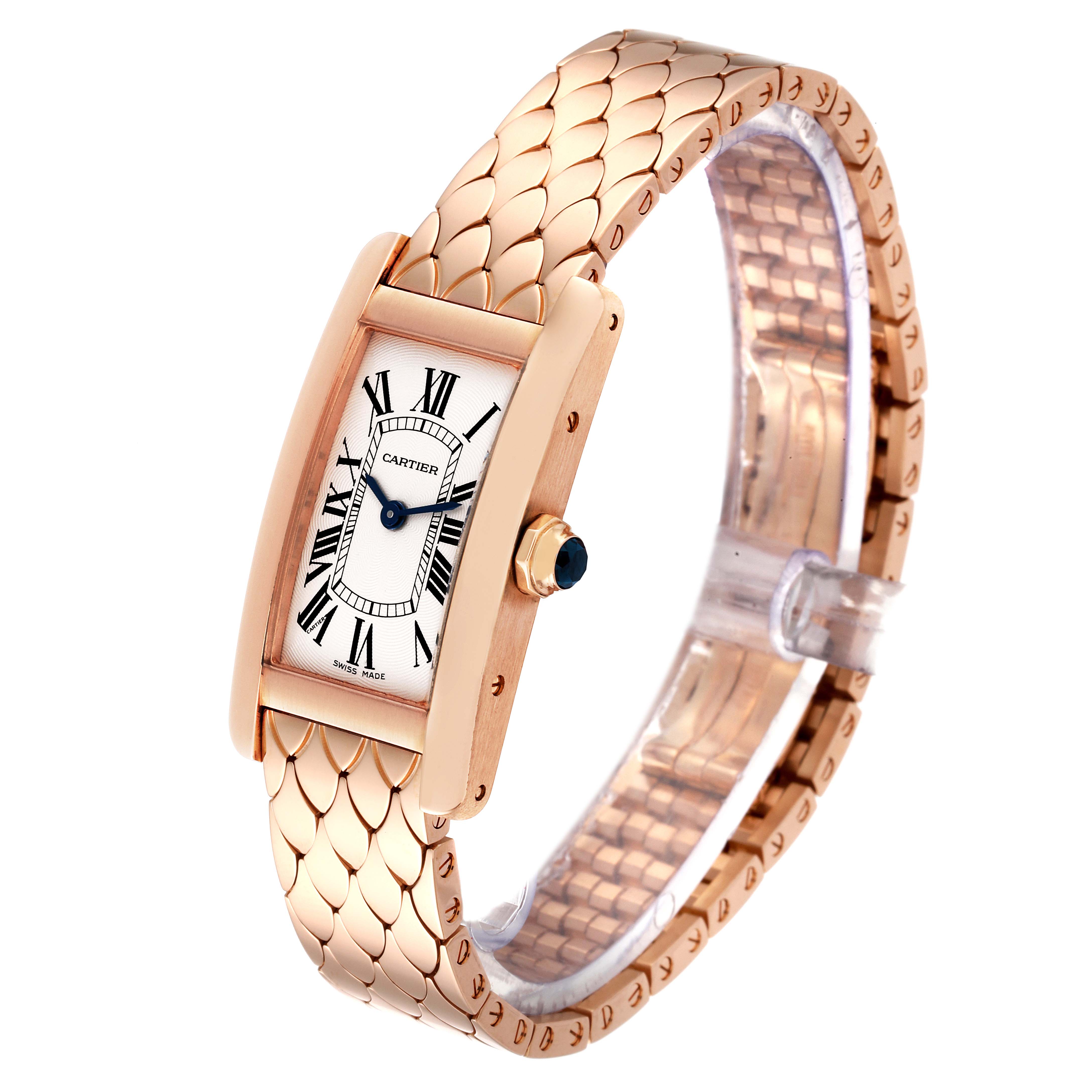 The image shows a Cartier Tank Américaine watch at a slight angle, highlighting its gold case, Roman numeral dial, and bracelet.