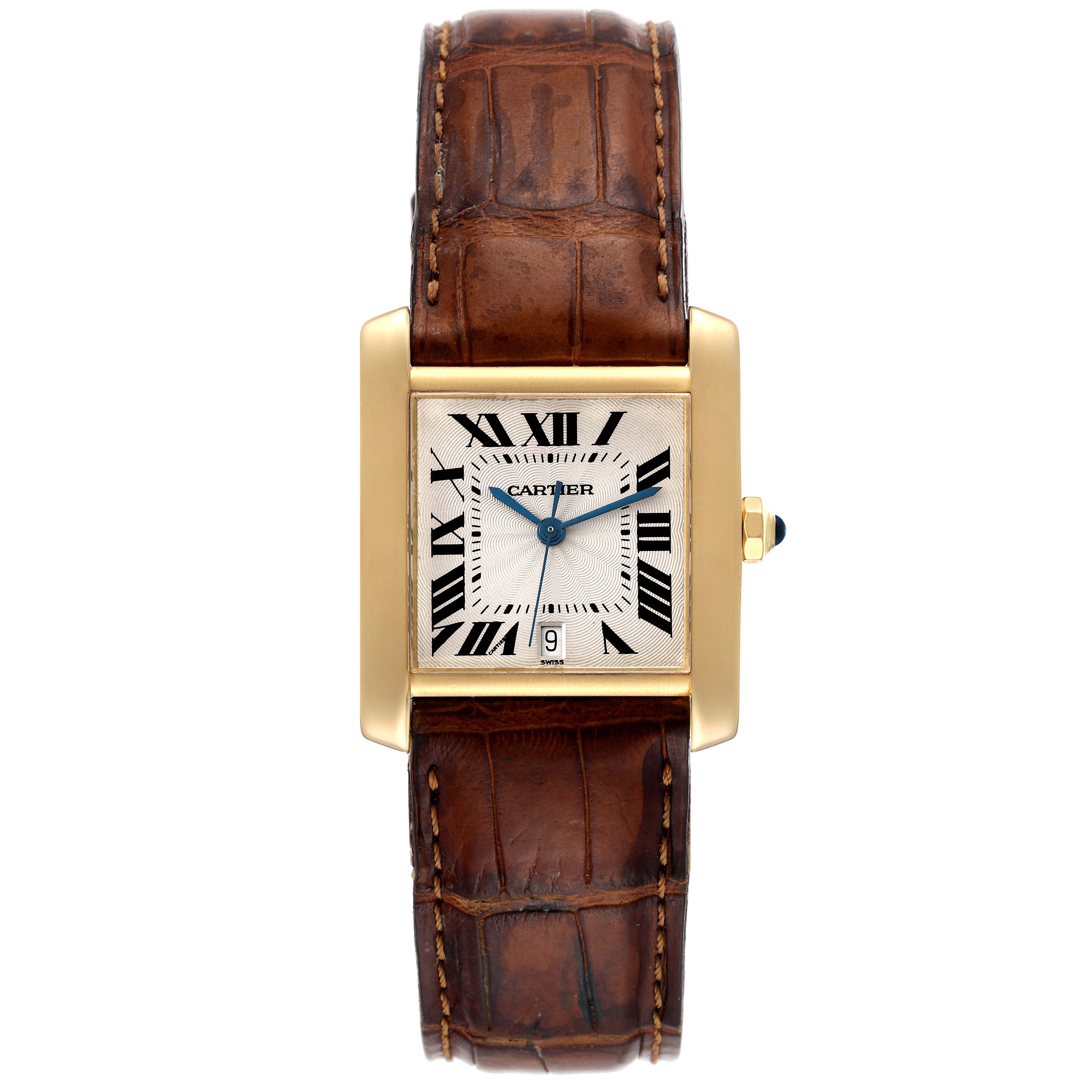 The image shows a front view of the Cartier Tank Francaise W5000156 Men's Yellow Gold Silver Dial W5000156 Men's Yellow Gold Silver Dial watch with a brown leather strap and golden rectangular case.