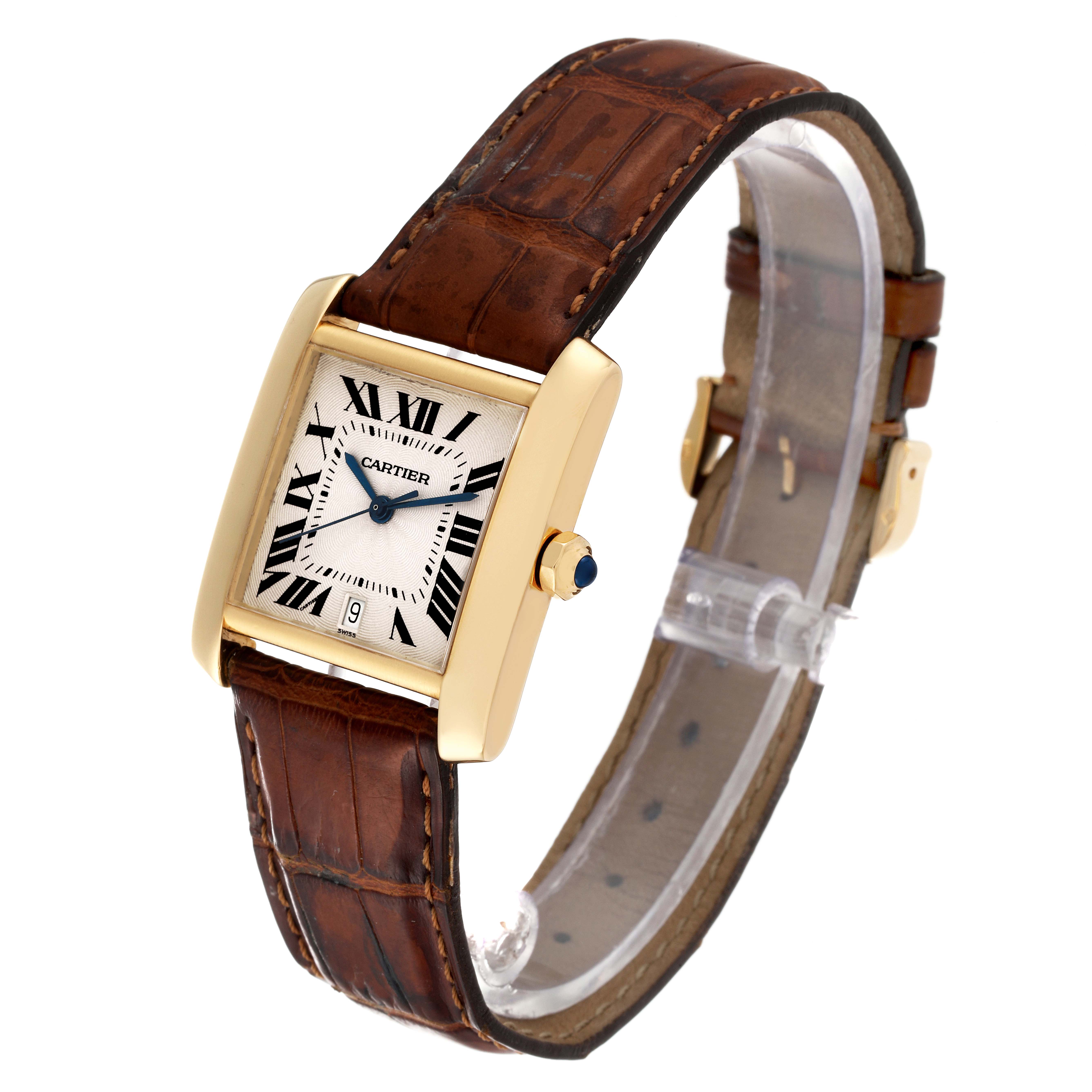 The Cartier Tank Francaise W5000156 Men's Yellow Gold Silver Dial W5000156 Men's Yellow Gold Silver Dial watch is shown at a slight angle displaying the face, gold case, crown, and leather strap.
