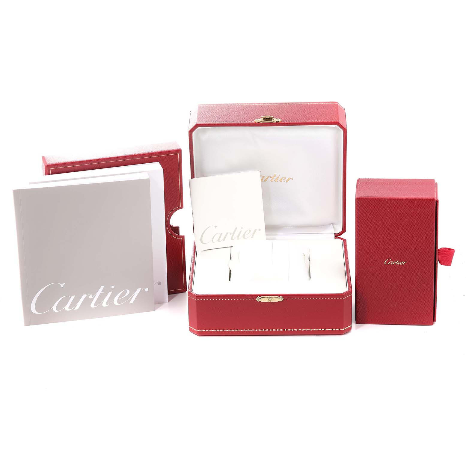 This image shows the packaging and manuals for the Cartier Tank Française watch, including red boxes and branded booklets.