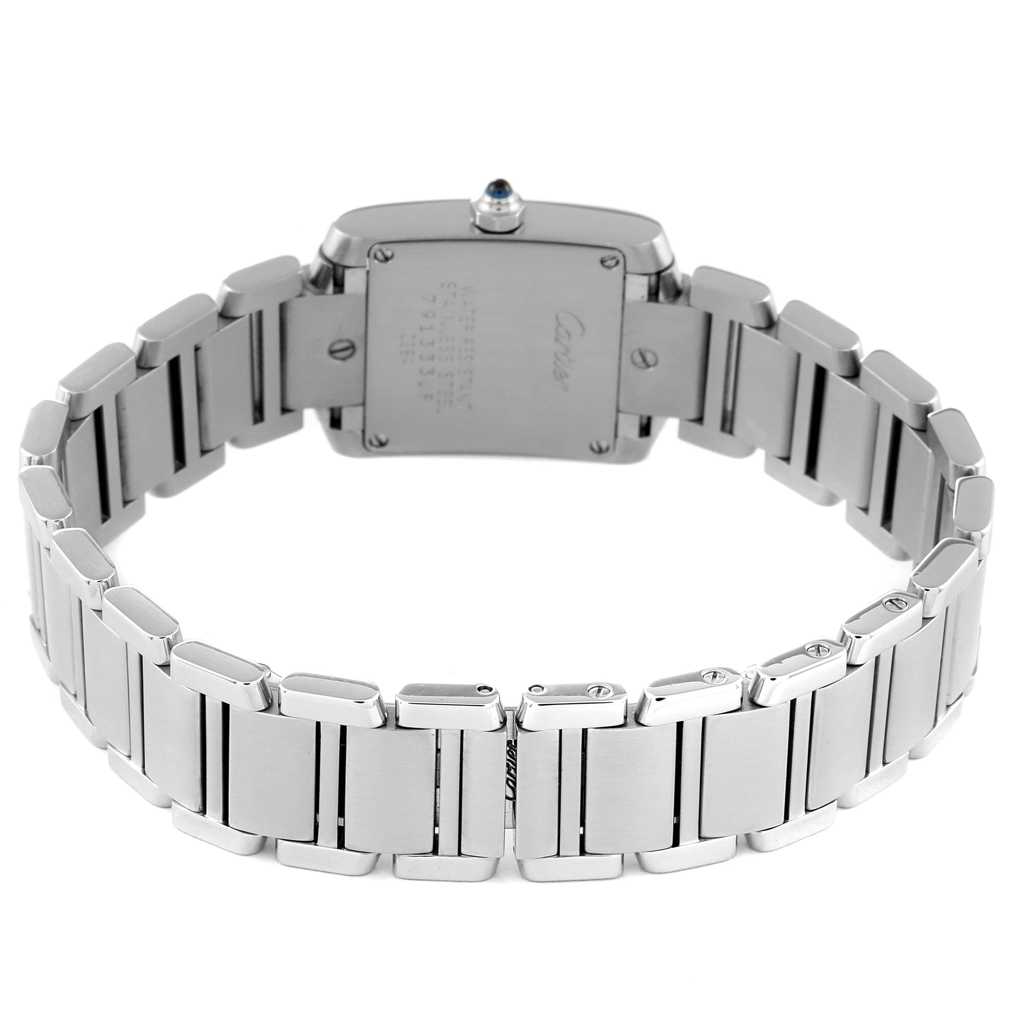 The image shows the back view of a Cartier Tank Francaise W51008Q3 Women
s Stainless Steel Silver Dial W51008Q3 Women
s Stainless Steel Silver Dial watch, highlighting its metal bracelet and caseback.