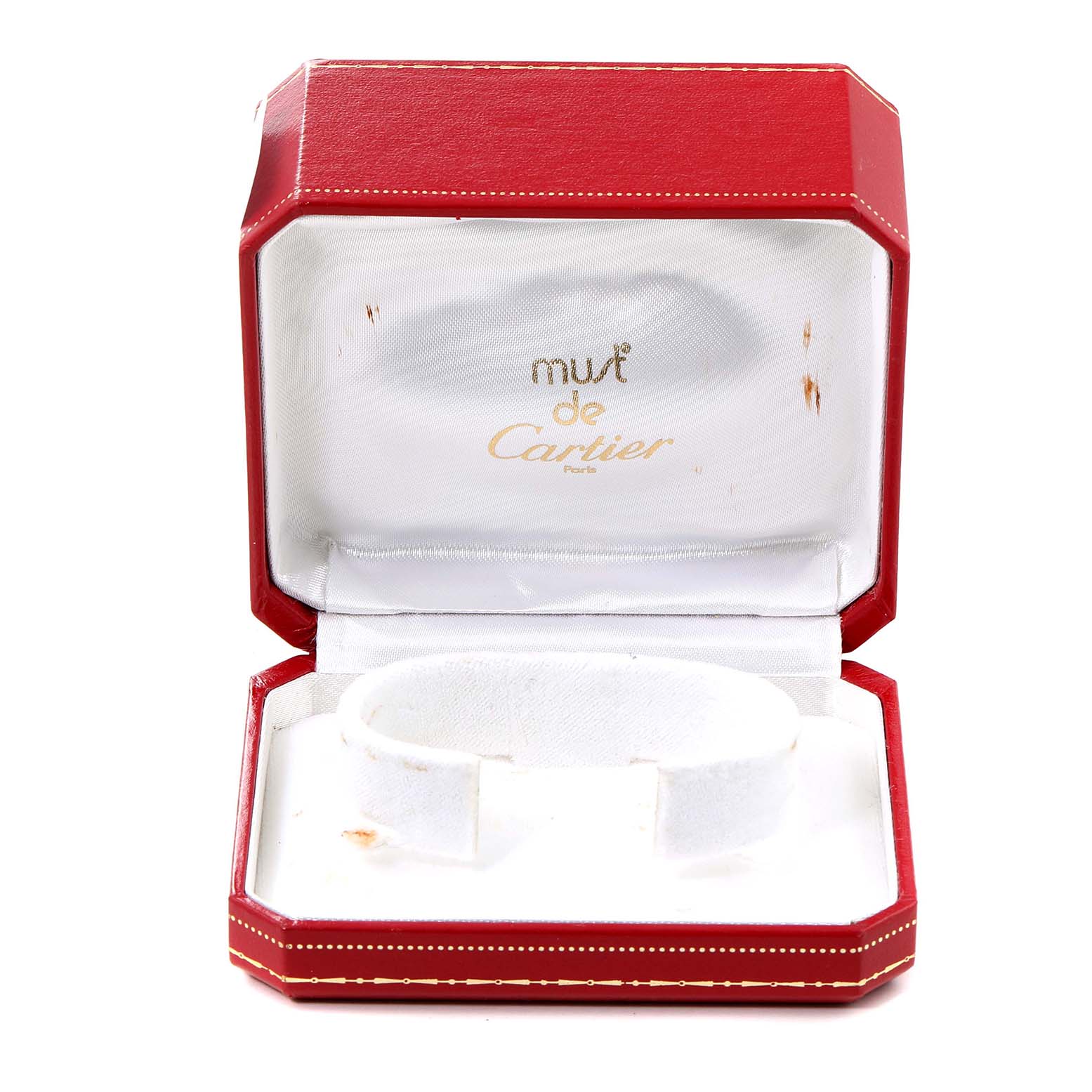 The image shows an empty red Cartier box for the Tank Francaise model, displaying the logo on the inside lid.