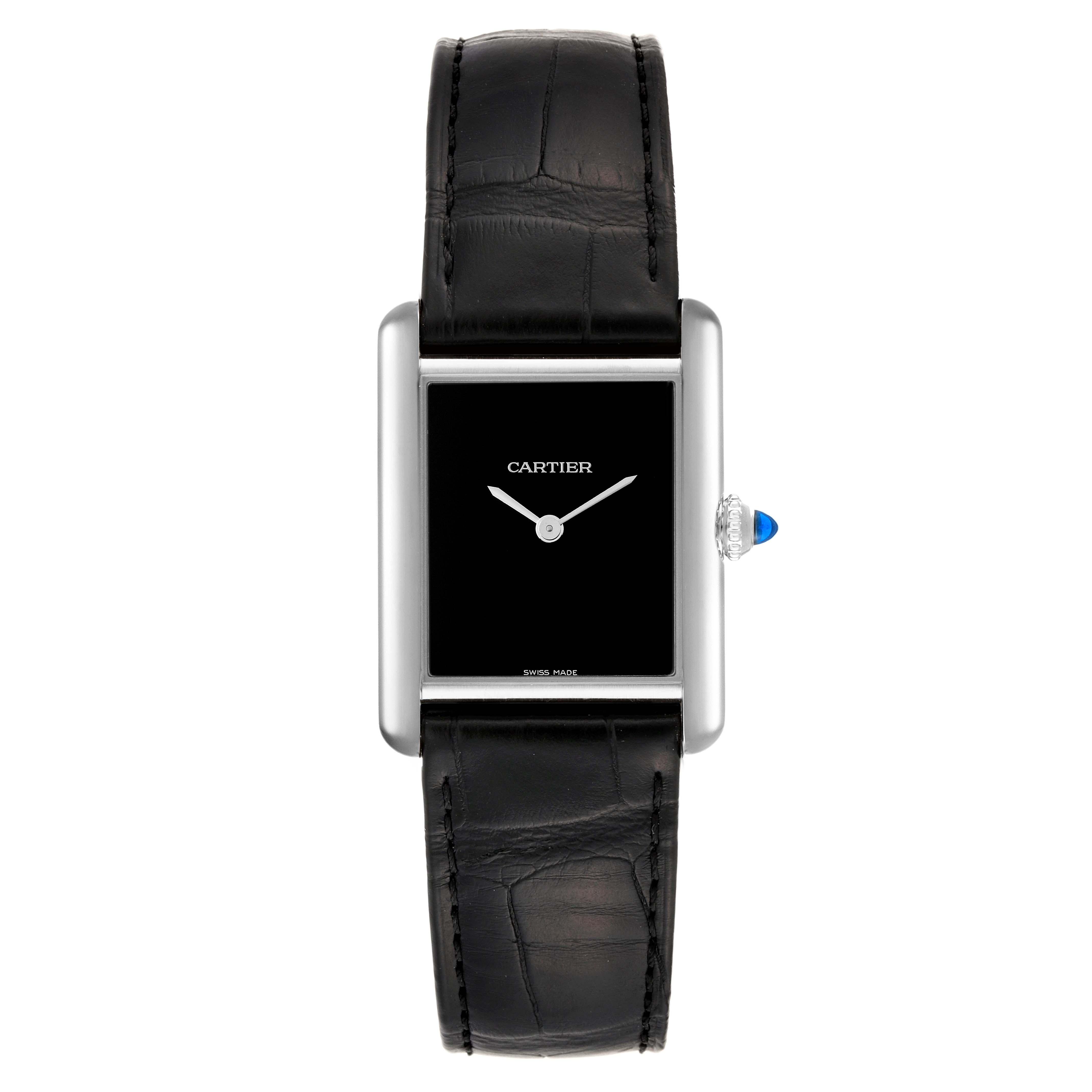 The image shows a Cartier Tank Must WSTA0072 Women
s Stainless Steel Black Dial WSTA0072 Women
s Stainless Steel Black Dial watch from a top view, featuring a black leather strap and a rectangular black dial.
