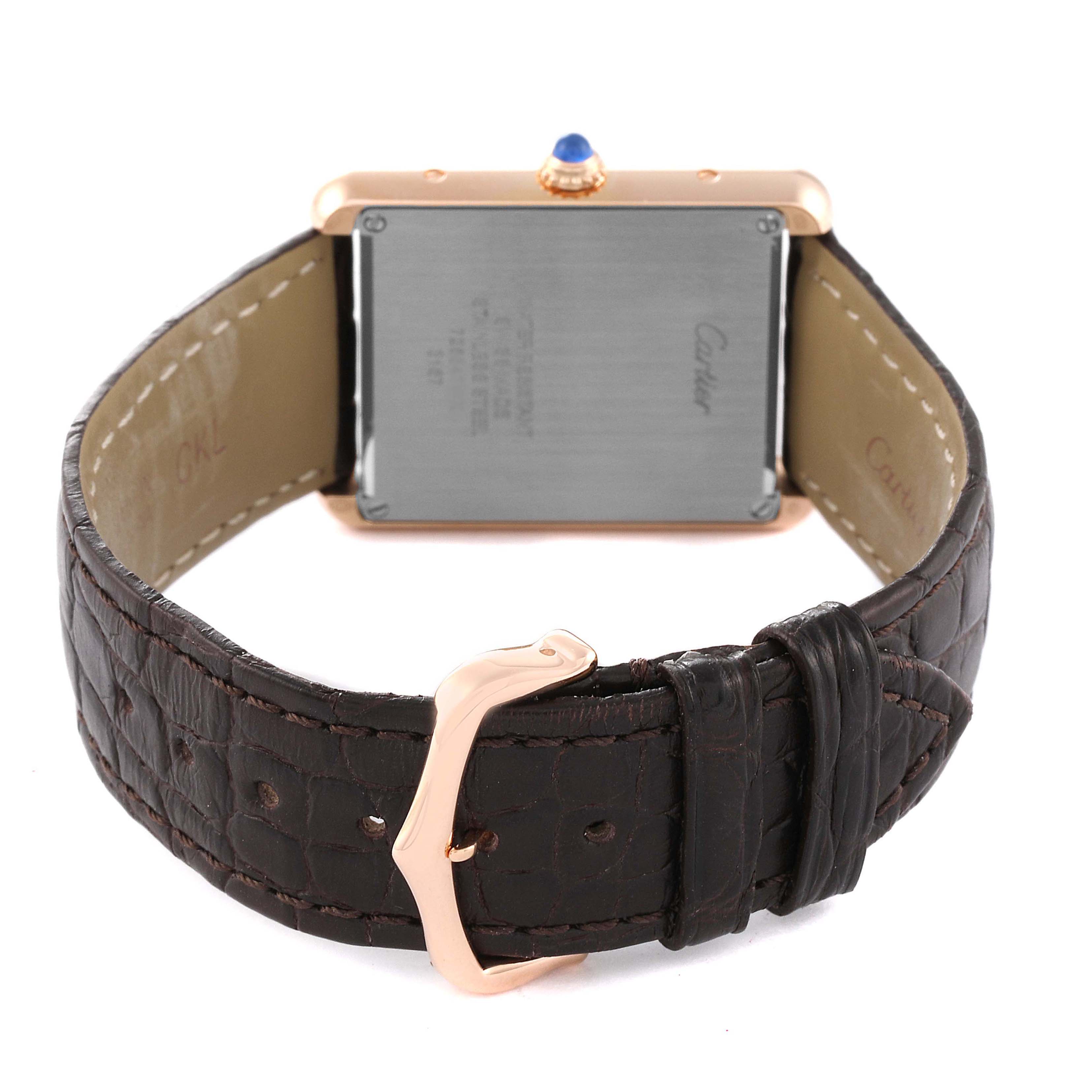 This image shows the back view of the Cartier Tank Solo W5200025 Men's Rose Gold Silver Dial W5200025 Men's Rose Gold Silver Dial watch, focusing on its case back and leather strap with buckle.