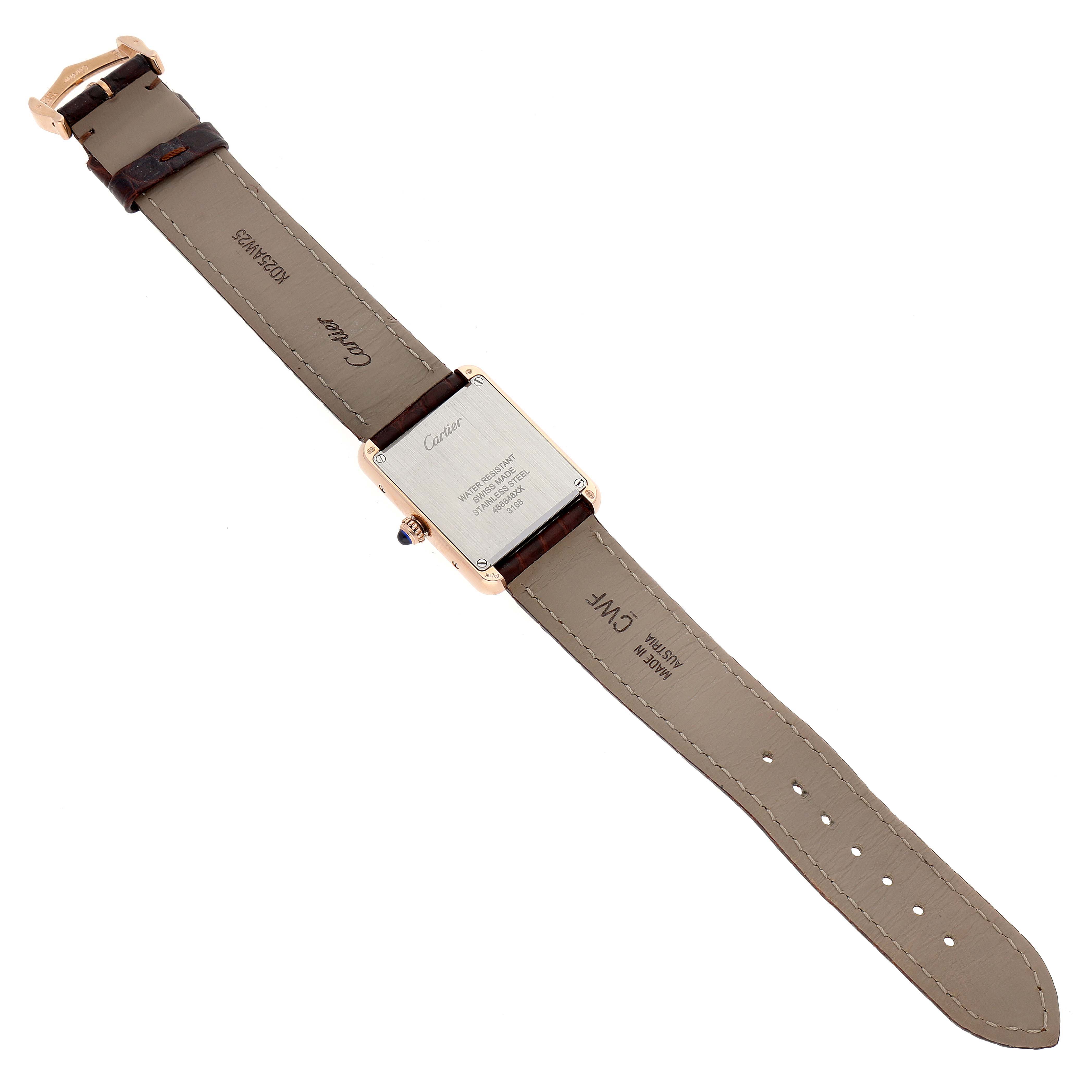 The image shows the back case and strap of the Cartier Tank Solo W5200024 Women's Rose Gold Silver Dial W5200024 Women's Rose Gold Silver Dial watch laid flat.