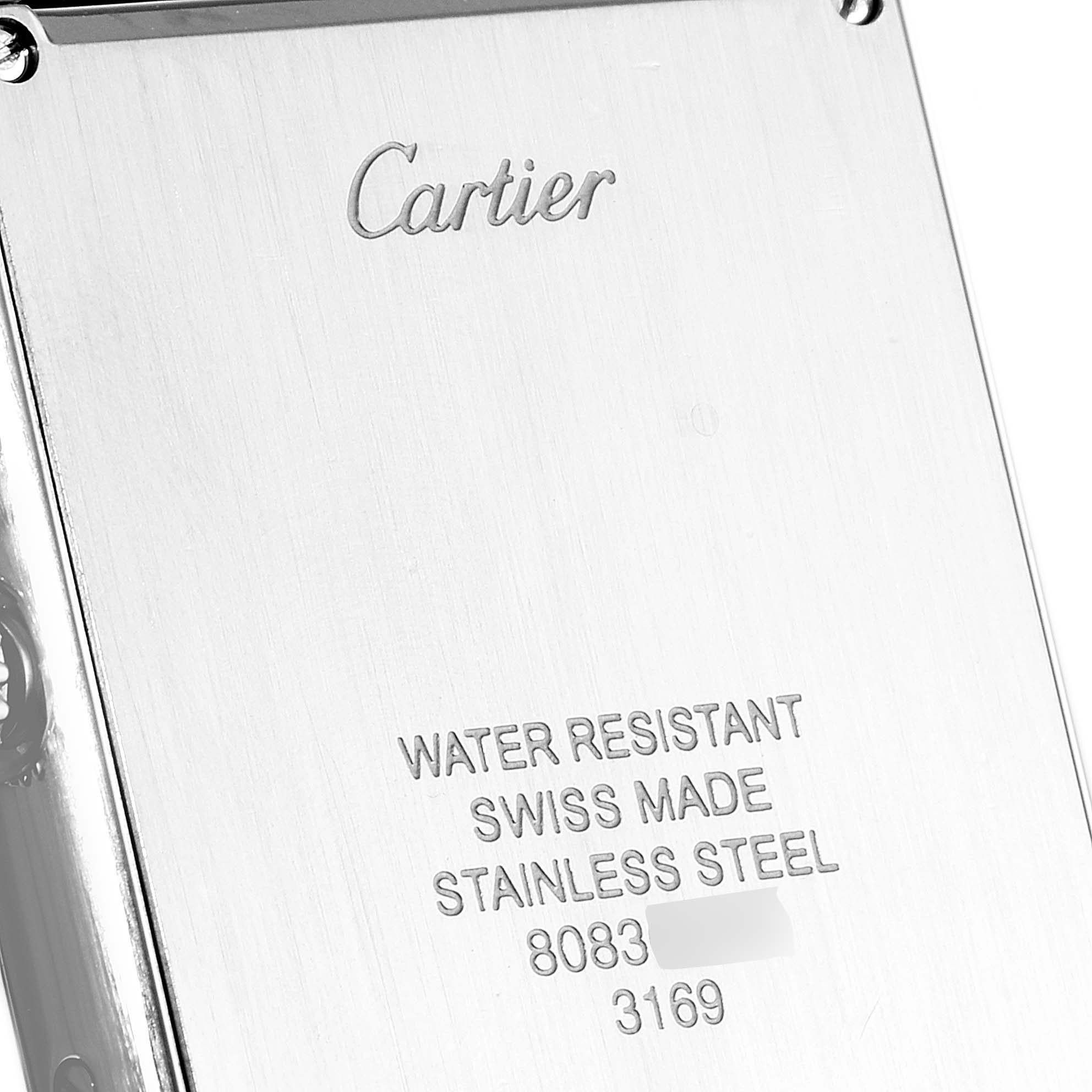 This image shows the backplate of a Cartier Tank Solo W5200014 Men
s Stainless Steel Silver Dial W5200014 Men
s Stainless Steel Silver Dial watch, displaying its branding and specifications.