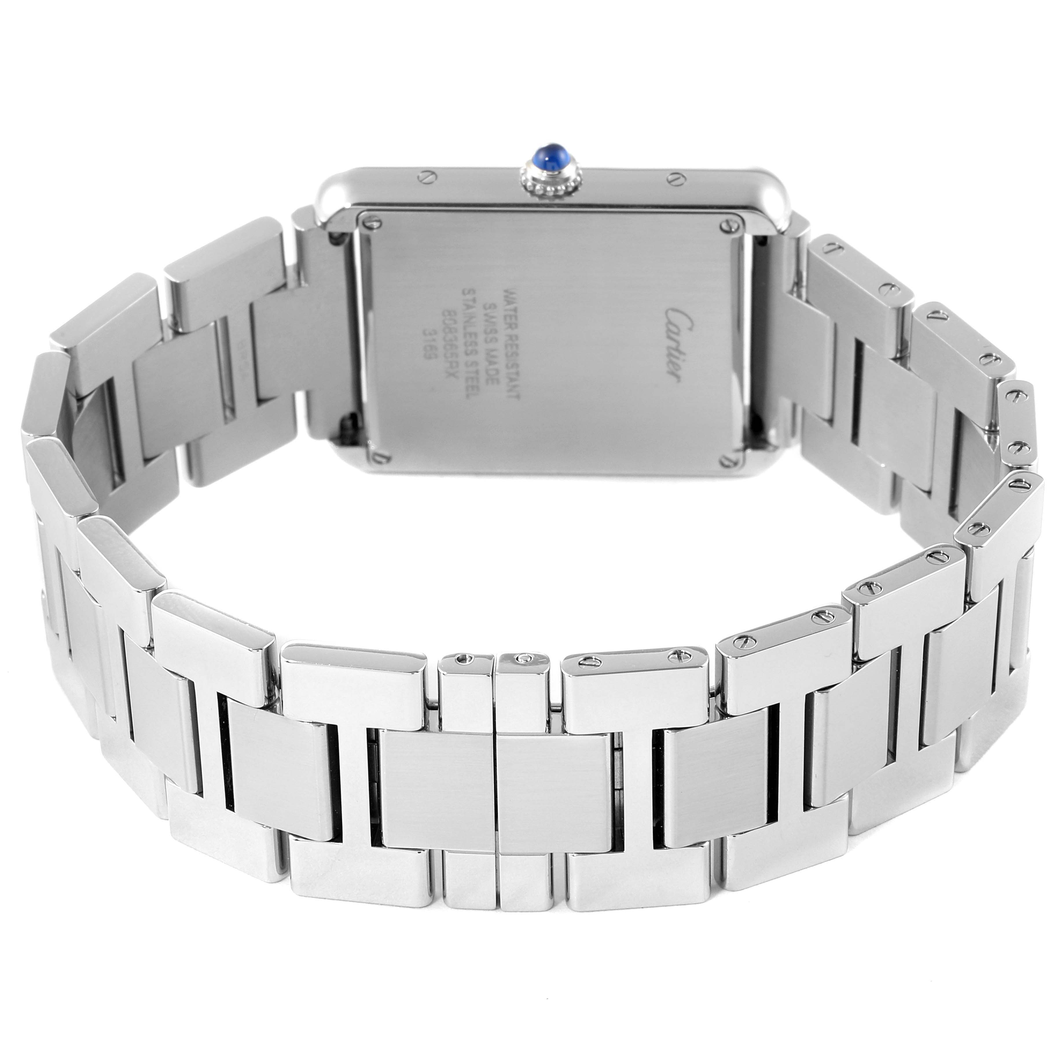 The image shows the back view of a Cartier Tank Solo W5200014 Men
s Stainless Steel Silver Dial W5200014 Men
s Stainless Steel Silver Dial watch with a stainless steel bracelet and a blue cabochon crown.