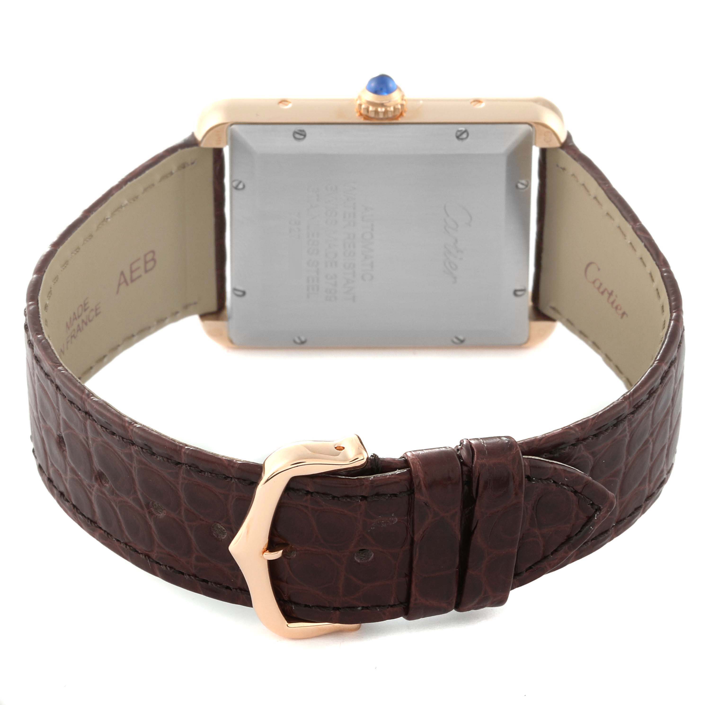 The image shows the back and strap of a Cartier Tank Solo W5200026 Men
s Steel and Gold (two tone) Silver Dial W5200026 Men
s Steel and Gold (two tone) Silver Dial watch, highlighting the leather band and buckle.