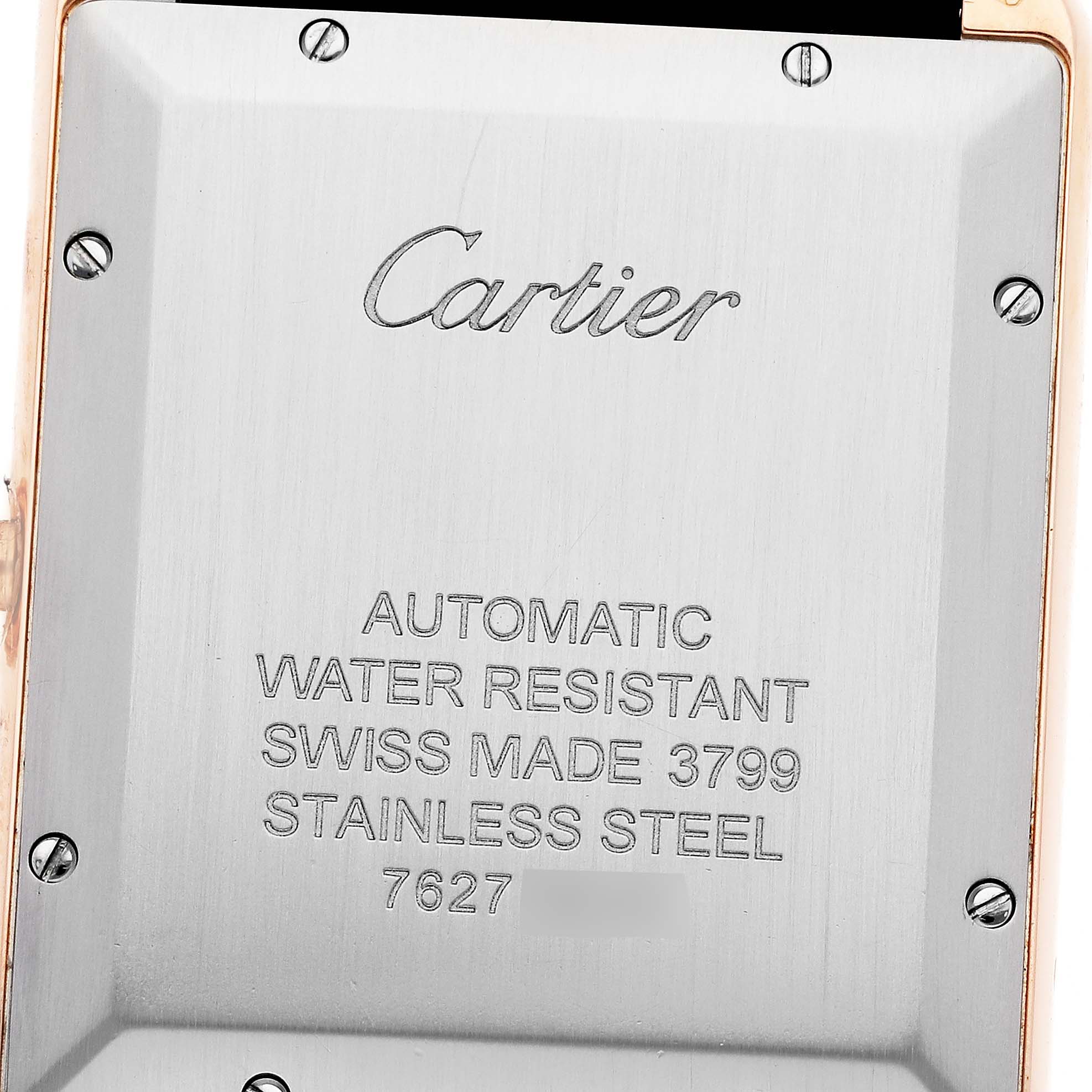 This image shows the back case of a Cartier Tank Solo W5200026 Men
s Steel and Gold (two tone) Silver Dial W5200026 Men
s Steel and Gold (two tone) Silver Dial watch, displaying its specifications and engraving.