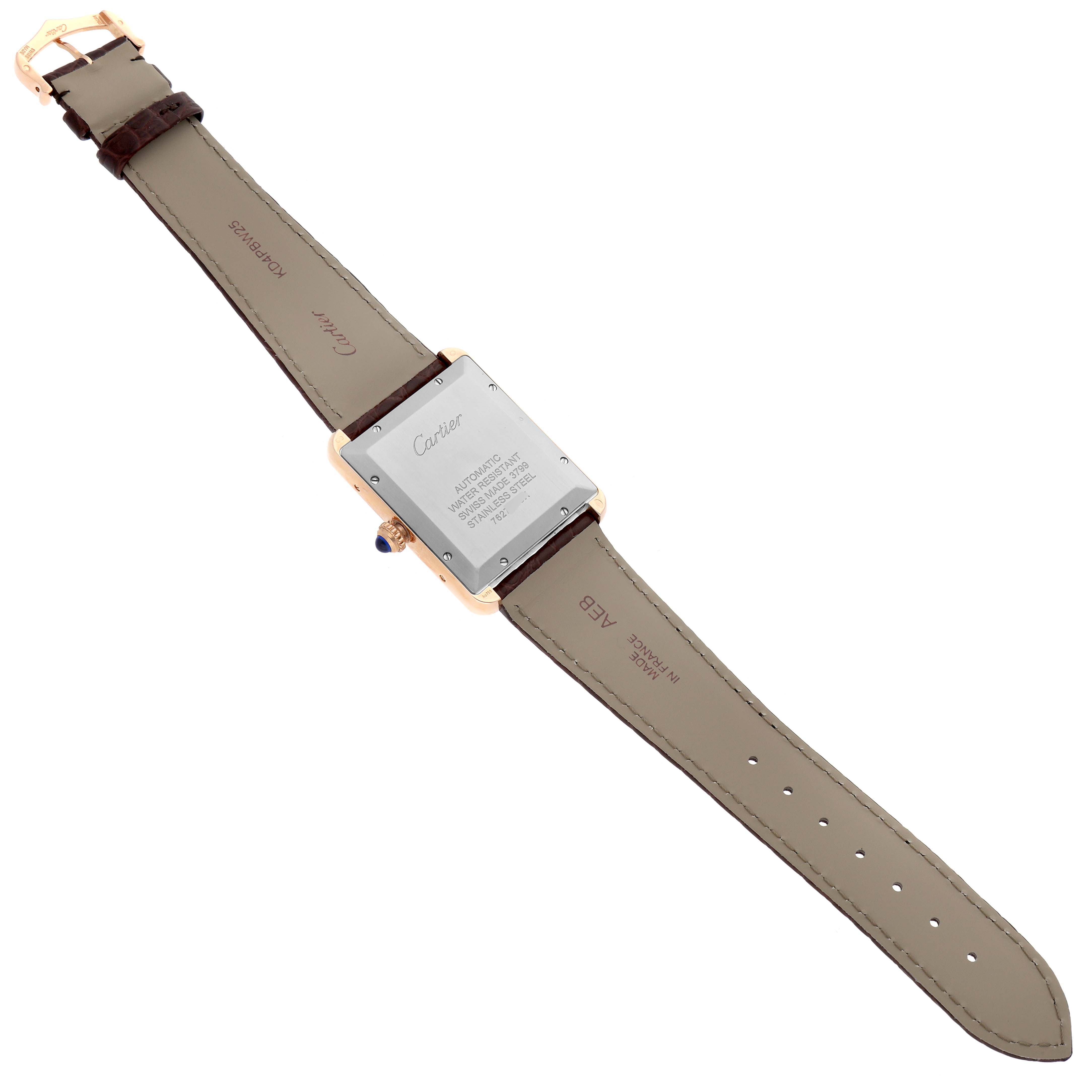 The image shows the back view of a Cartier Tank Solo W5200026 Men
s Steel and Gold (two tone) Silver Dial W5200026 Men
s Steel and Gold (two tone) Silver Dial watch, highlighting its case back and leather strap.