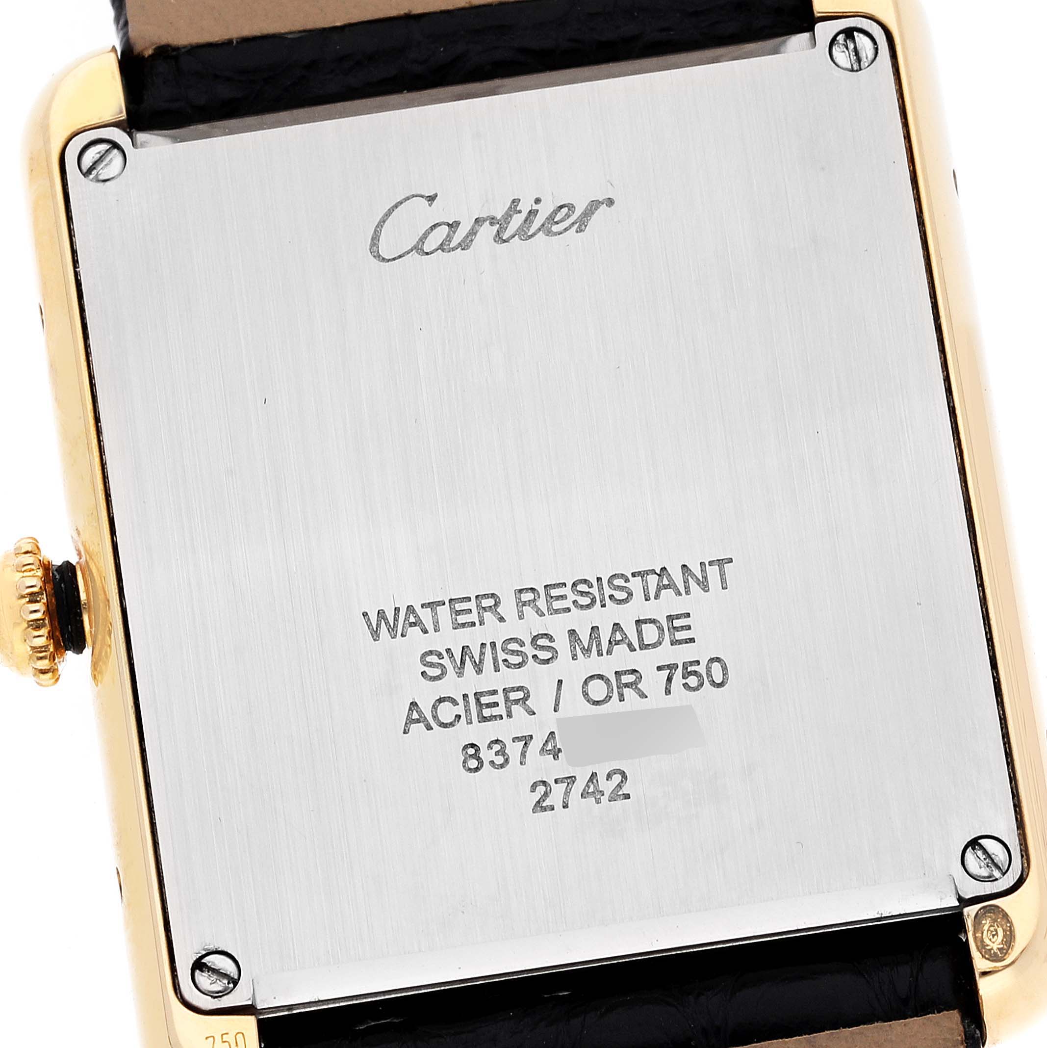 This image shows the back case of a Cartier Tank Solo W1018855 Men's Yellow Gold Silver Dial W1018855 Men's Yellow Gold Silver Dial watch, highlighting the brand name and specifications.