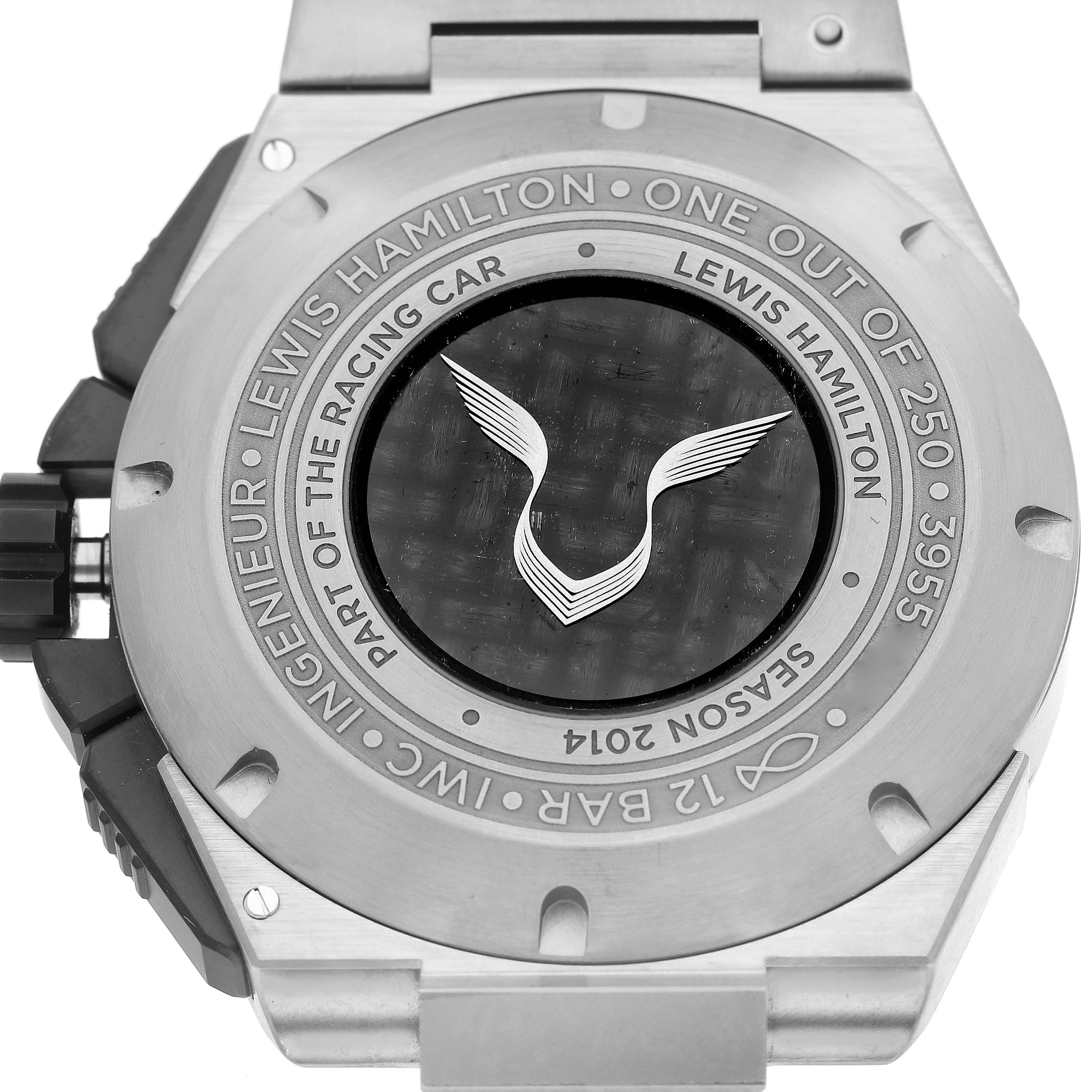 The image shows the back of an IWC Ingenieur IW379602 Men's Titanium Black Dial IW379602 Men's Titanium Black Dial watch case, featuring an engraving and branding.