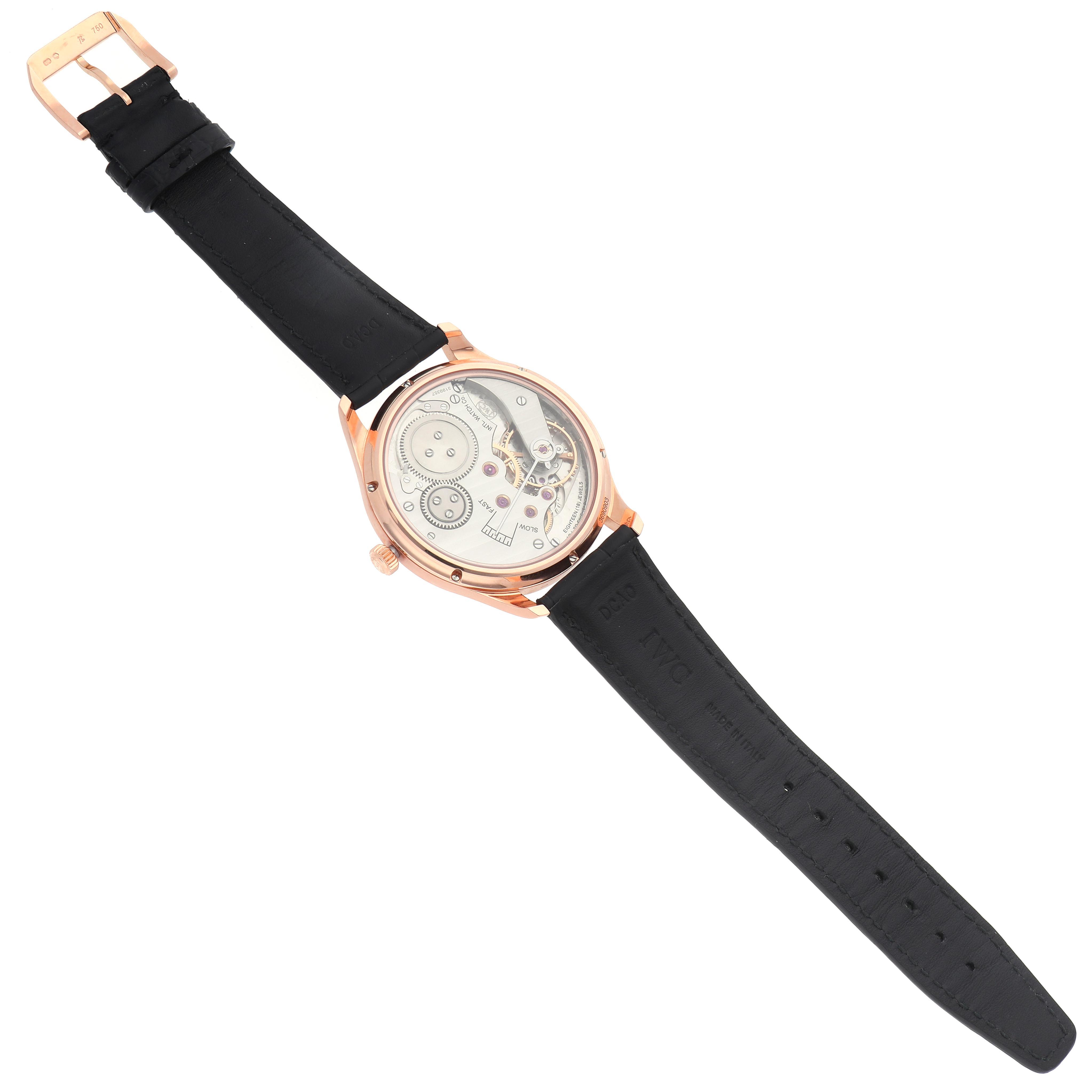 The IWC Portuguese IW545406 Men's Rose Gold Grey Dial IW545406 Men's Rose Gold Grey Dial watch is shown from the back, highlighting its movement and leather strap.