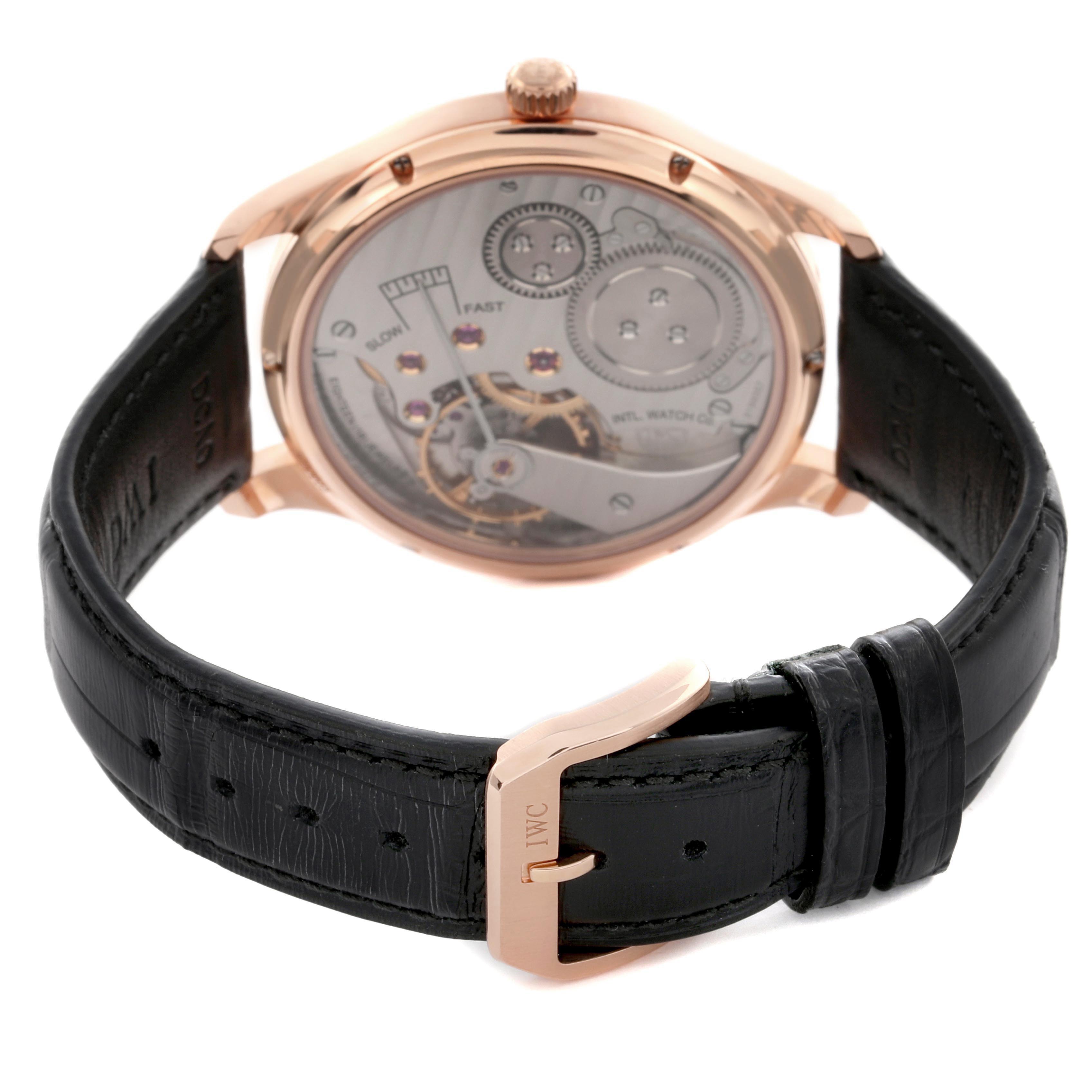 The IWC Portuguese IW545406 Men's Rose Gold Grey Dial IW545406 Men's Rose Gold Grey Dial watch is shown from the rear, highlighting its transparent case back and intricate movement.