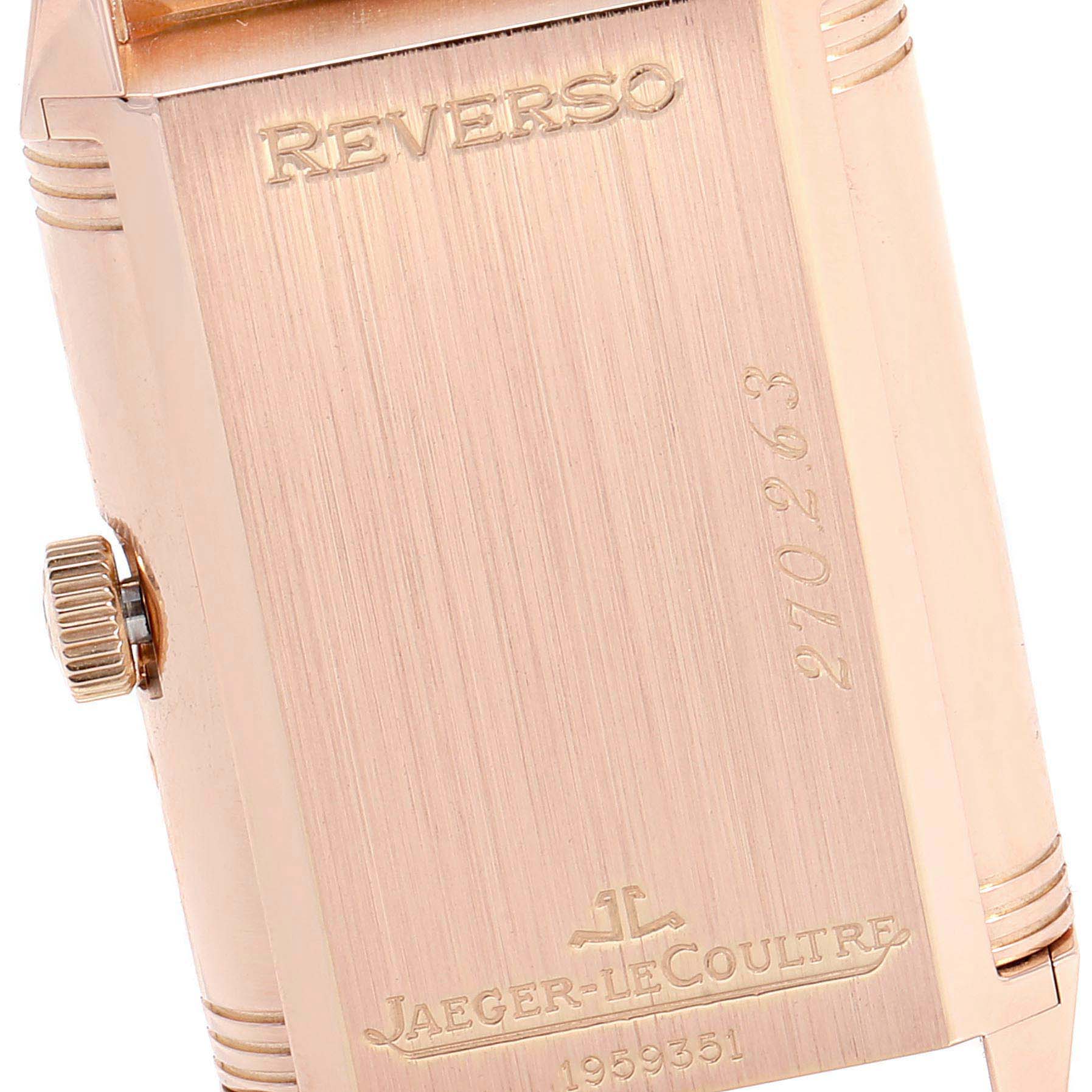 The image shows the reverse side of the Jaeger LeCoultre Reverso Q3042420 Men's Rose Gold Silver Dial Q3042420 Men's Rose Gold Silver Dial watch, highlighting the brand name, model name, crown, and markings.