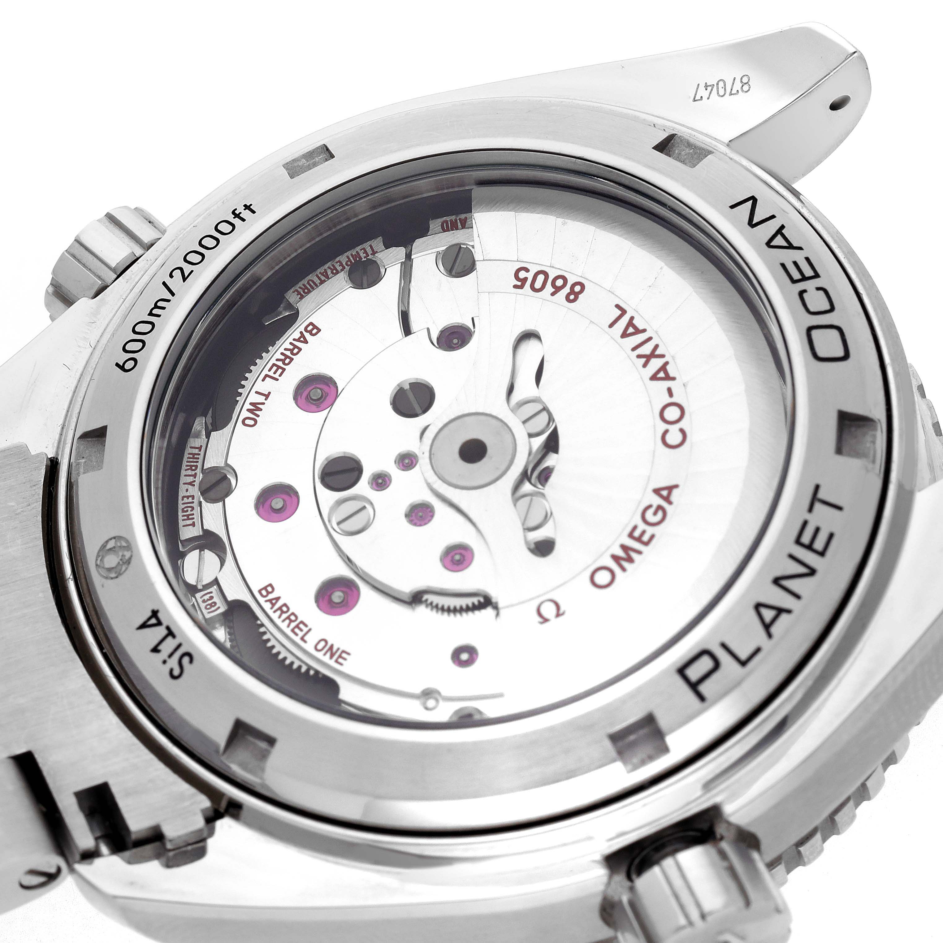 The image shows the back of the Omega Planet Ocean 232.30.44.22.01.001 Men's Stainless Steel Black Dial 232.30.44.22.01.001 Men's Stainless Steel Black Dial model, highlighting the movement and mechanism.