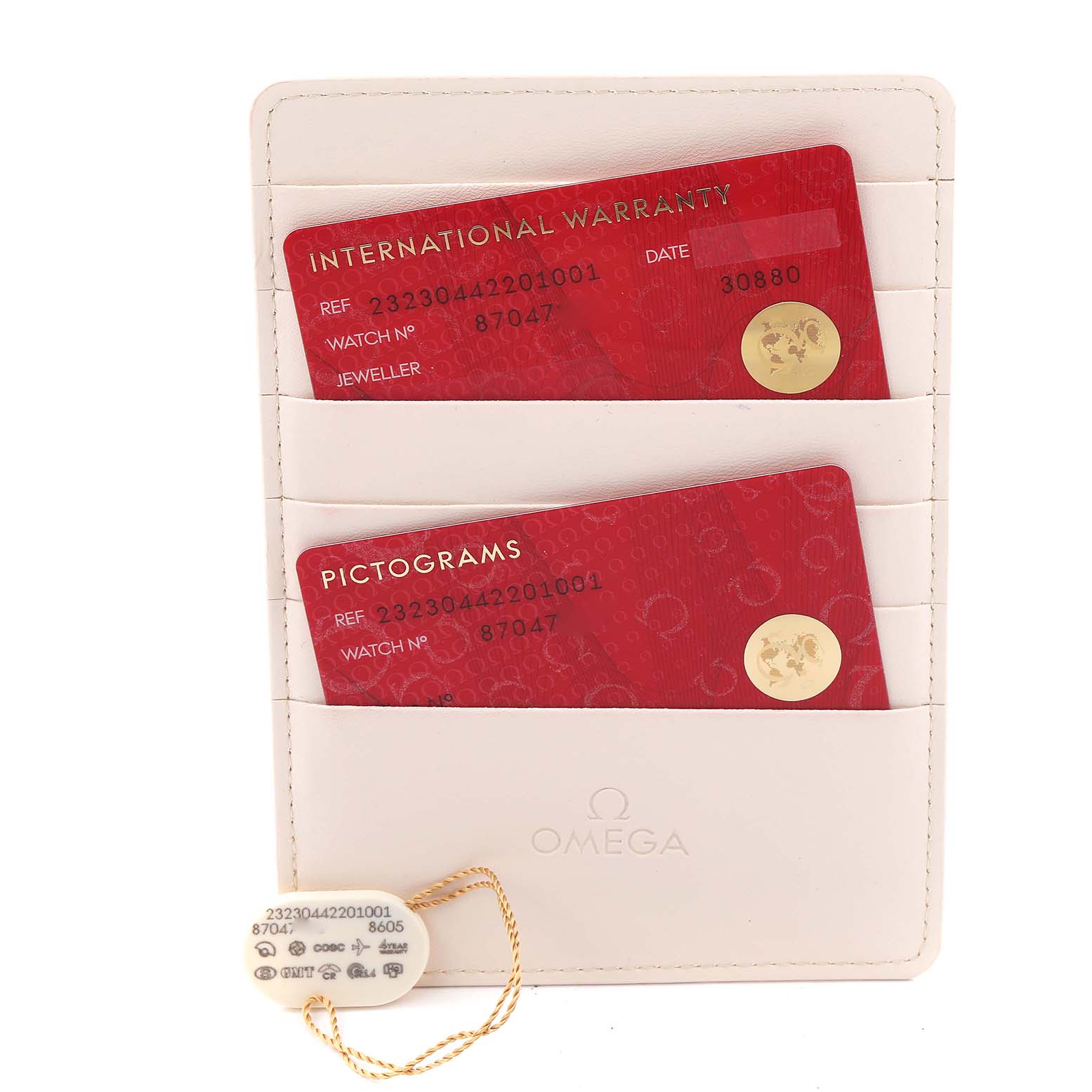 The image shows Omega Planet Ocean 232.30.44.22.01.001 Men's Stainless Steel Black Dial 232.30.44.22.01.001 Men's Stainless Steel Black Dial model accessories: warranty cards and a white holder with a hang tag attached.