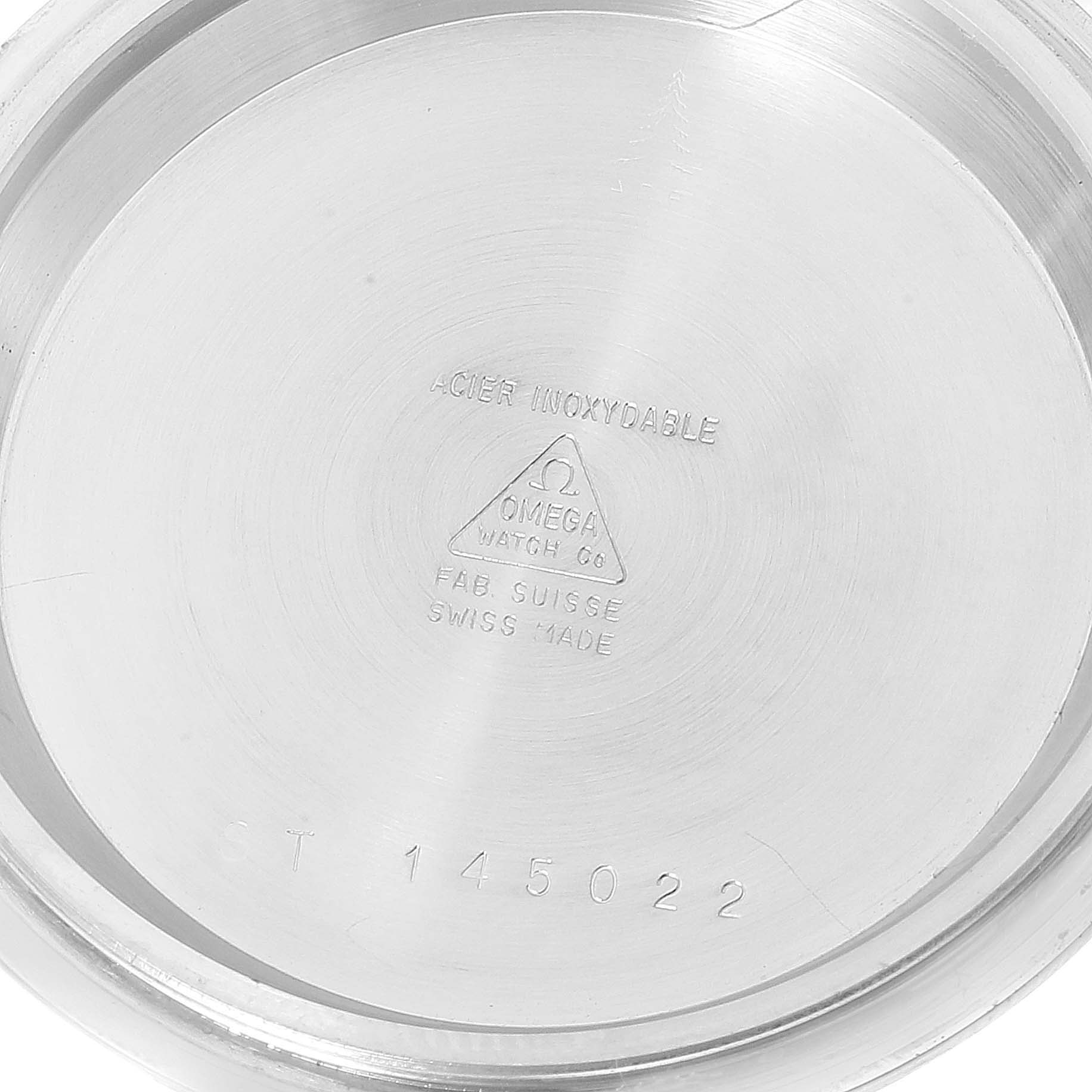 This image shows the inner case back of an Omega Speedmaster 3590.50.00 Men's Stainless Steel Black Dial 3590.50.00 Men's Stainless Steel Black Dial watch, highlighting the model number and "Swiss Made" verification.