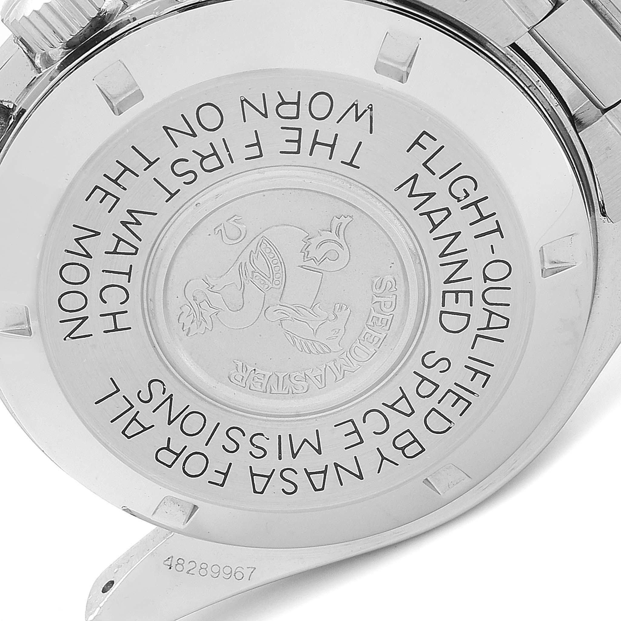 This image shows the back case of the Omega Speedmaster 3590.50.00 Men's Stainless Steel Black Dial 3590.50.00 Men's Stainless Steel Black Dial watch, featuring engravings and the model's logo.