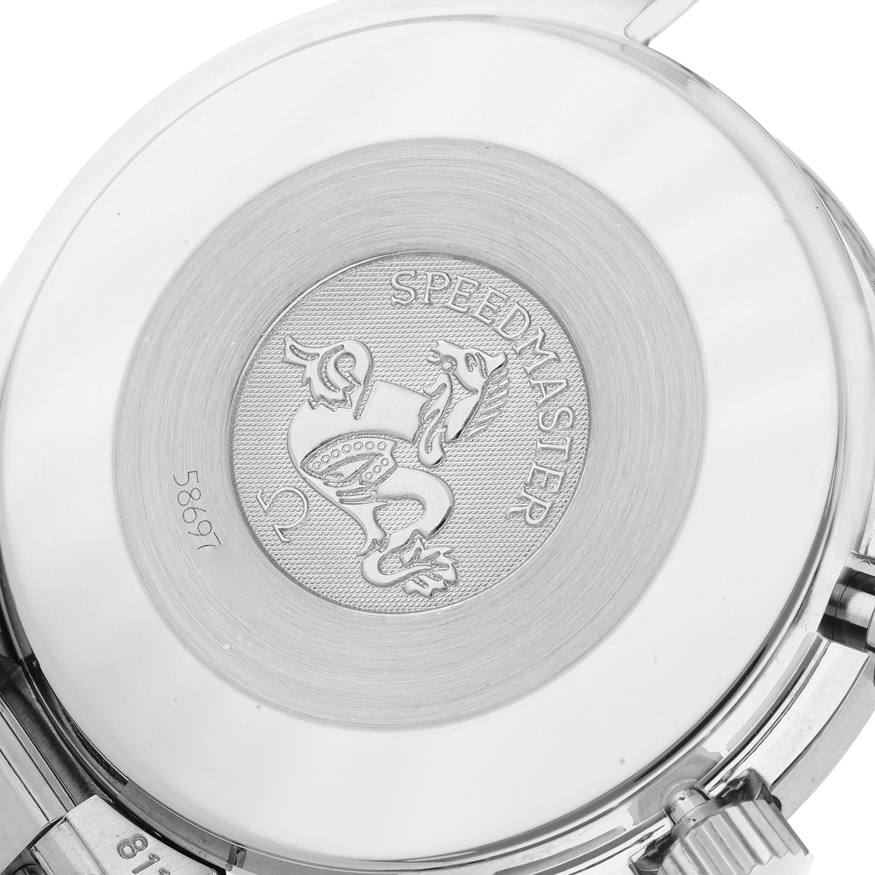 This image shows the case back of the Omega Speedmaster 3510.50.00 Men's Stainless Steel Black Dial 3510.50.00 Men's Stainless Steel Black Dial watch, featuring its engraved logo.