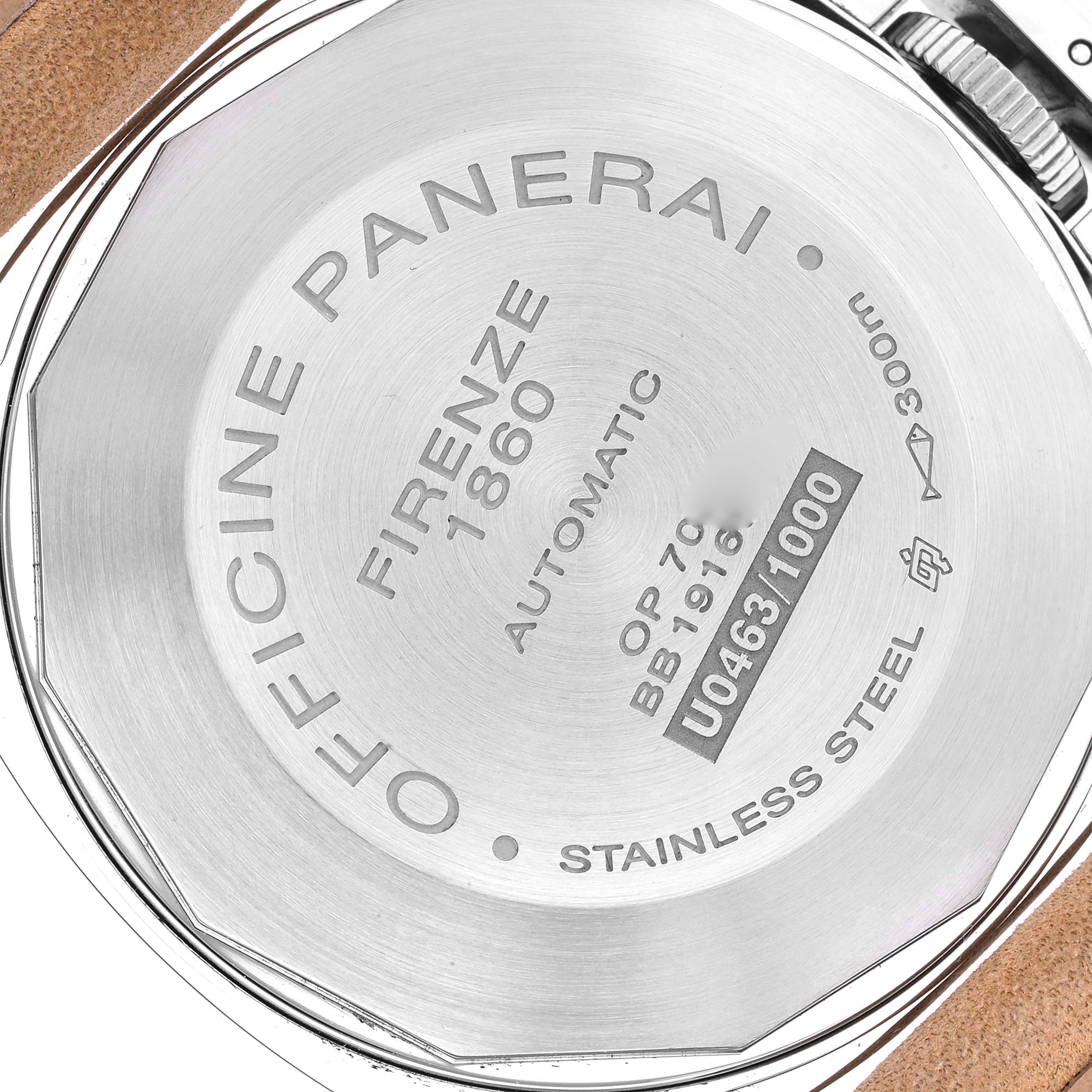 The image shows the back case of a Panerai Luminor PAM01088 Men
s Stainless Steel Black Dial PAM01088 Men
s Stainless Steel Black Dial watch, showcasing its inscriptions and a portion of the leather strap.