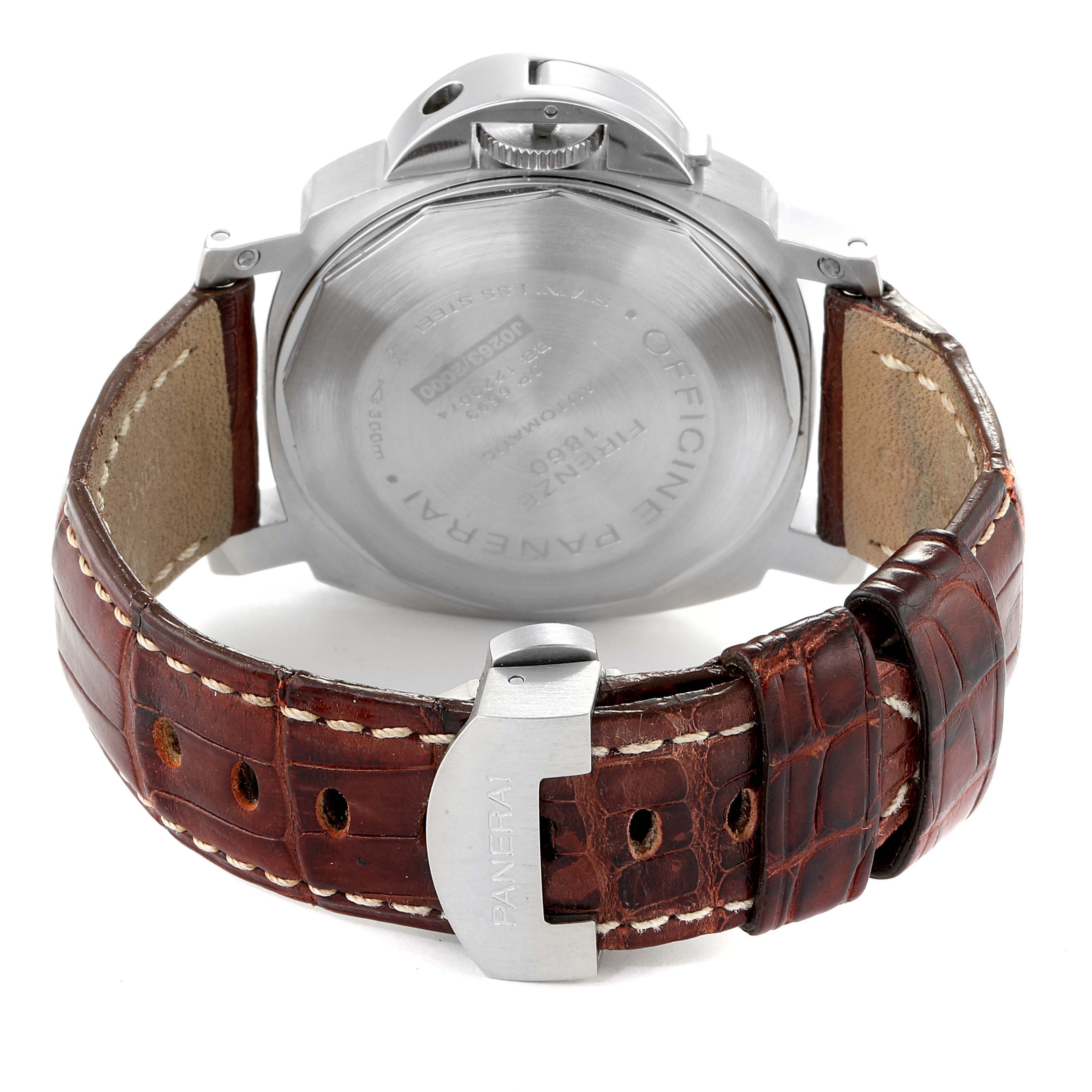 The image shows the back case and leather strap of a Luminor model by Panerai.