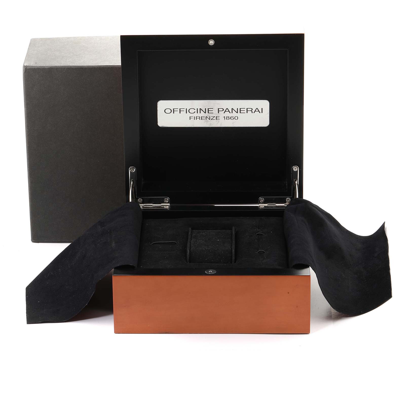 The image shows an open Panerai Luminor PAM00104  Men
s Stainless Steel Black Dial PAM00104  Men
s Stainless Steel Black Dial watch box with compartments for watch accessories and the brand
s logo on the inside of the lid.