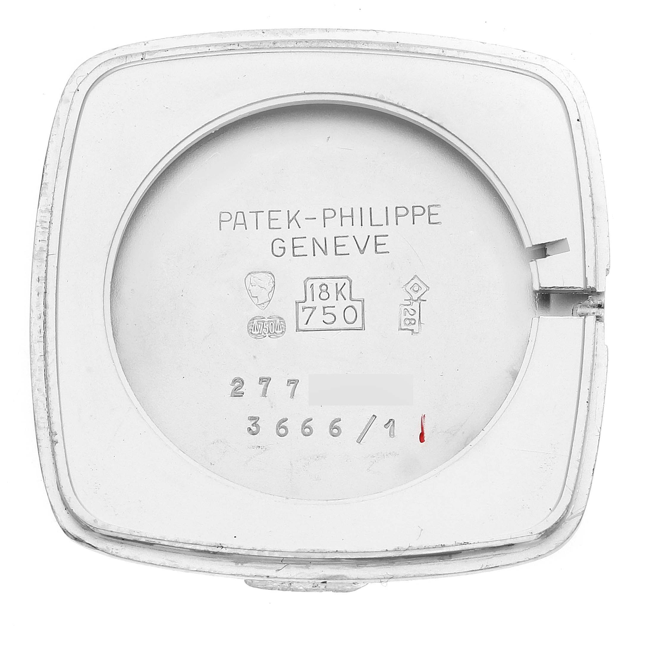 This image shows the inside back cover of a Vintage Patek Philippe watch, displaying hallmarks and inscriptions.