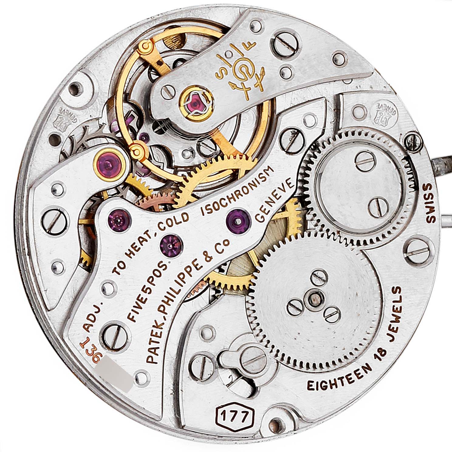 This is a close-up image showing the intricate inner workings of a Vintage Patek Philippe watch model.